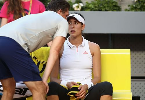 Garbine Muguruza pictured with Sam Sumyk at the Madrid Open - Image Source: Getty