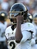 Photo: Colorado's five-star QB recruit Julian Lewis does “The Shedeur” while donning a Buffaloes hoodie