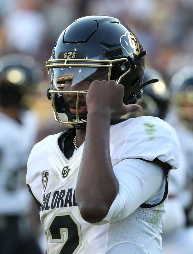 Photo: Colorado's five-star QB recruit Julian Lewis does “The Shedeur” while donning a Buffaloes hoodie