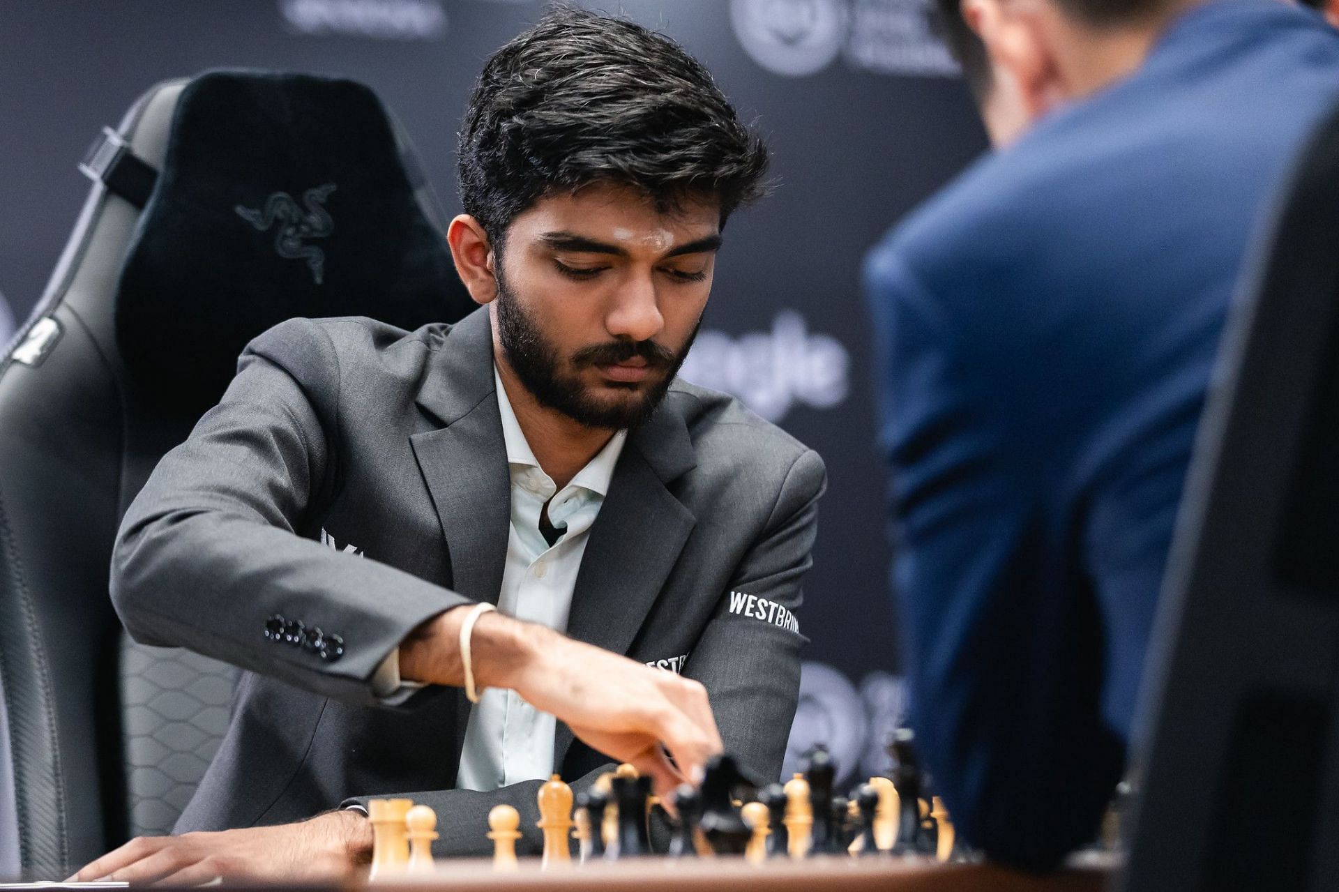 World Chess Championship 2024 Gukesh secures a win over Ding Liren in