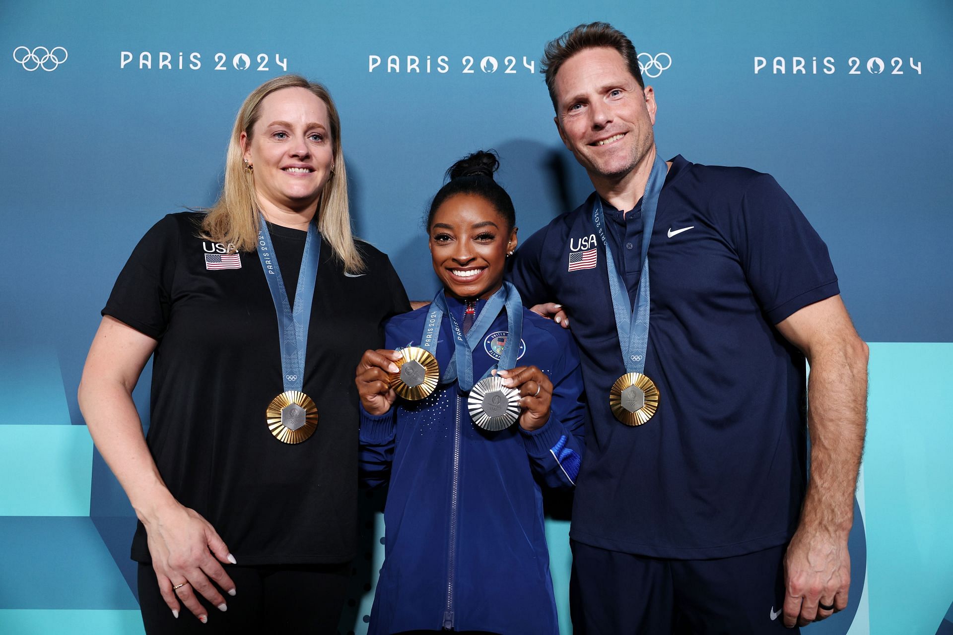 Biles with her coaches at the Olympic Games Paris 2024: (Source: Getty)