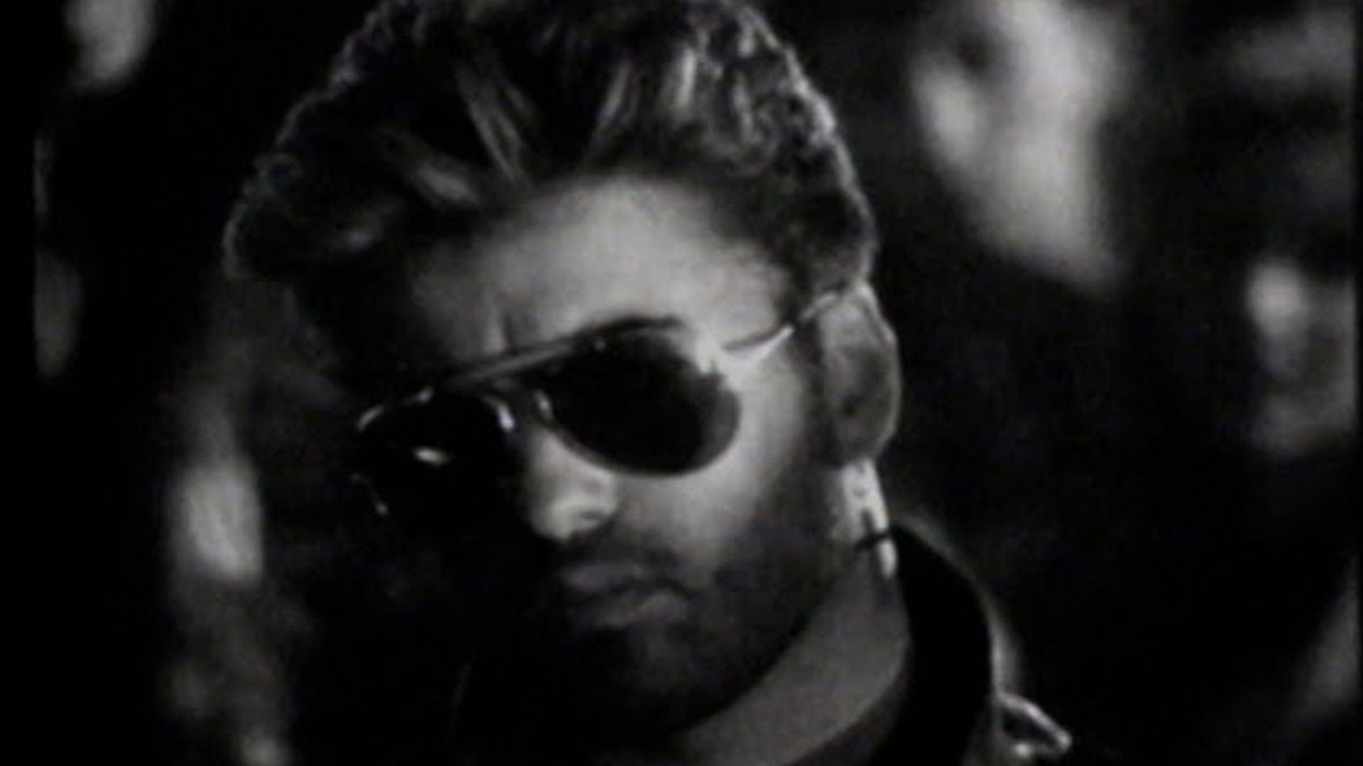 Still from Father Figure (Image via YouTube/georgemichael)