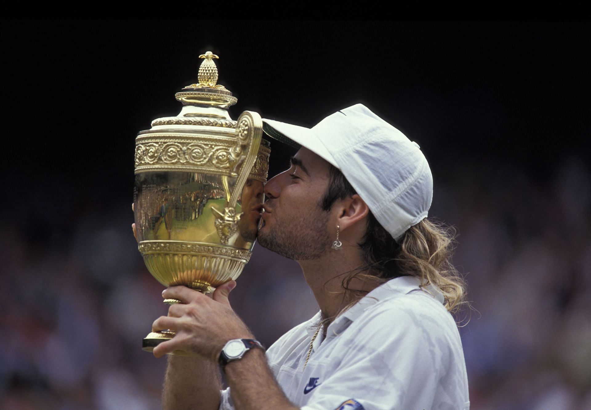 Andre Agassi at the 1992 Wimbledon. (Source: Getty) Andre Agassi at the 1999 French Open. (Source: Getty)