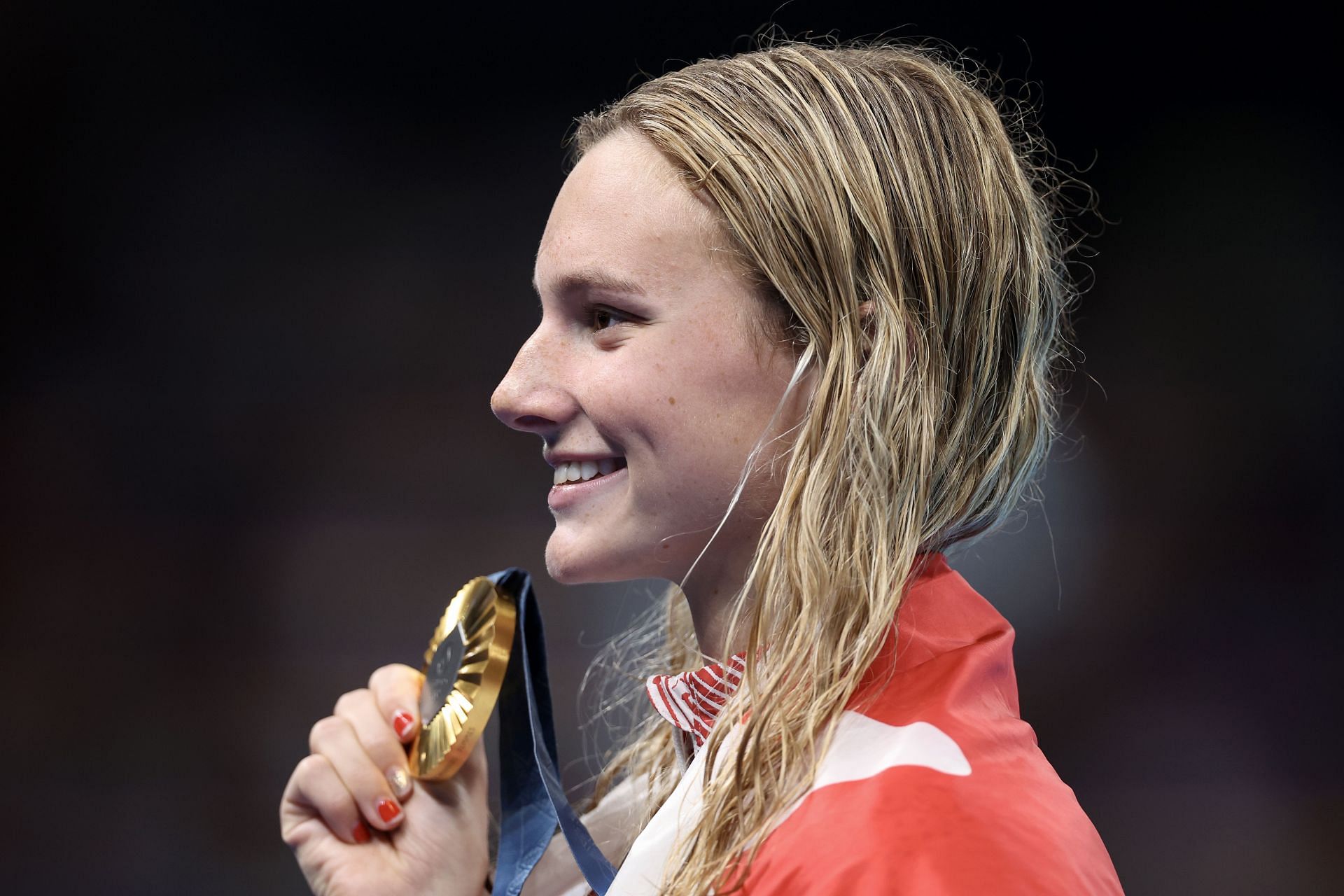 McIntosh flaunting her gold medal at the Olympic Games Paris 2024: (Source: Getty)