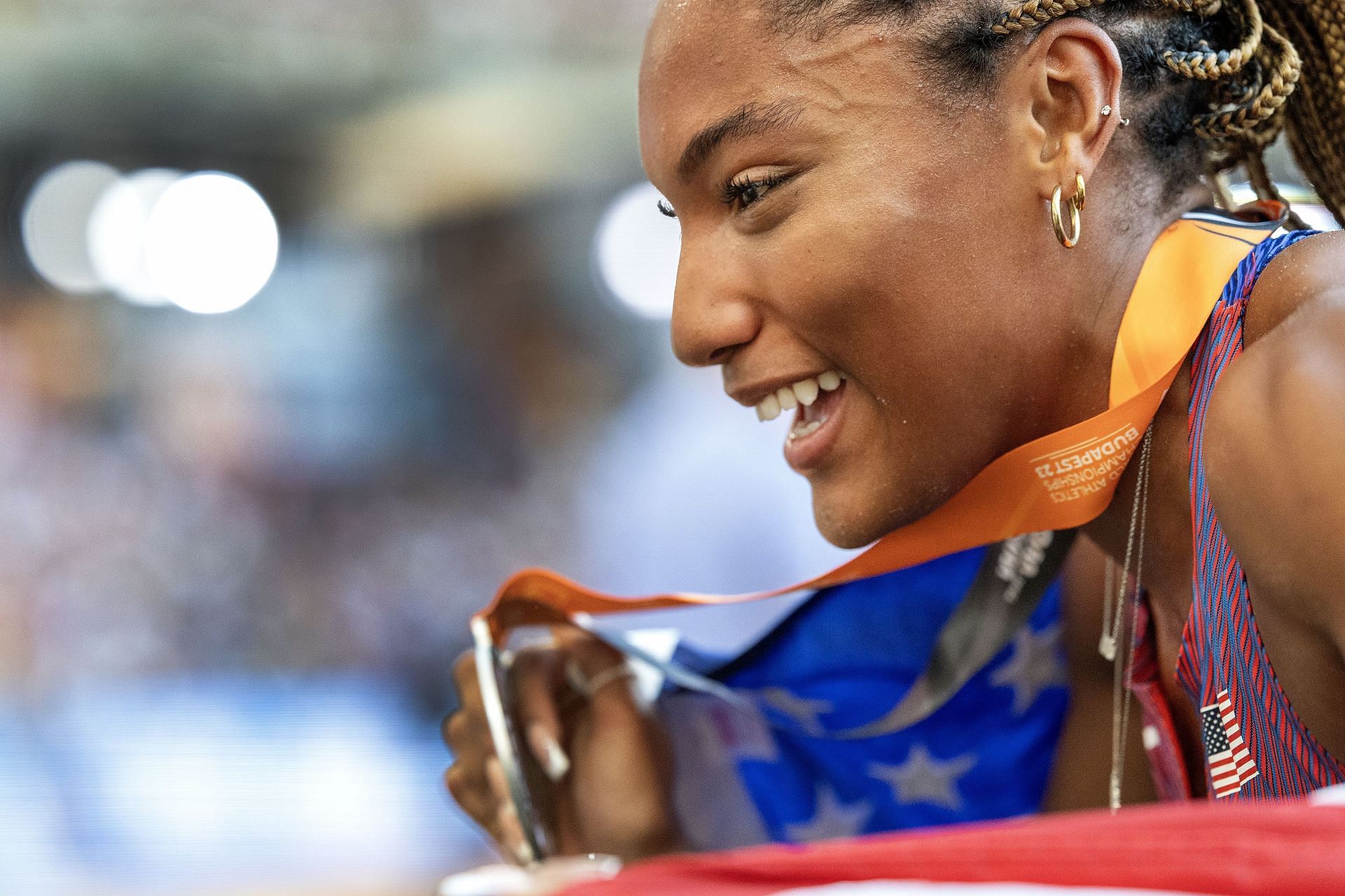 Davis-Woodhall showing off the silver medal she won in the long jump event during the 2023 World Championships (Image via: Getty Images)