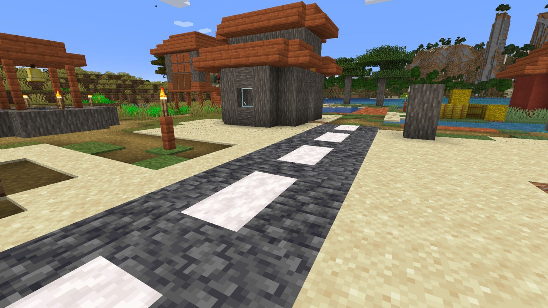 Asphalt roads are great for players looking to add some realism to their builds (Image via Mojang Studios)