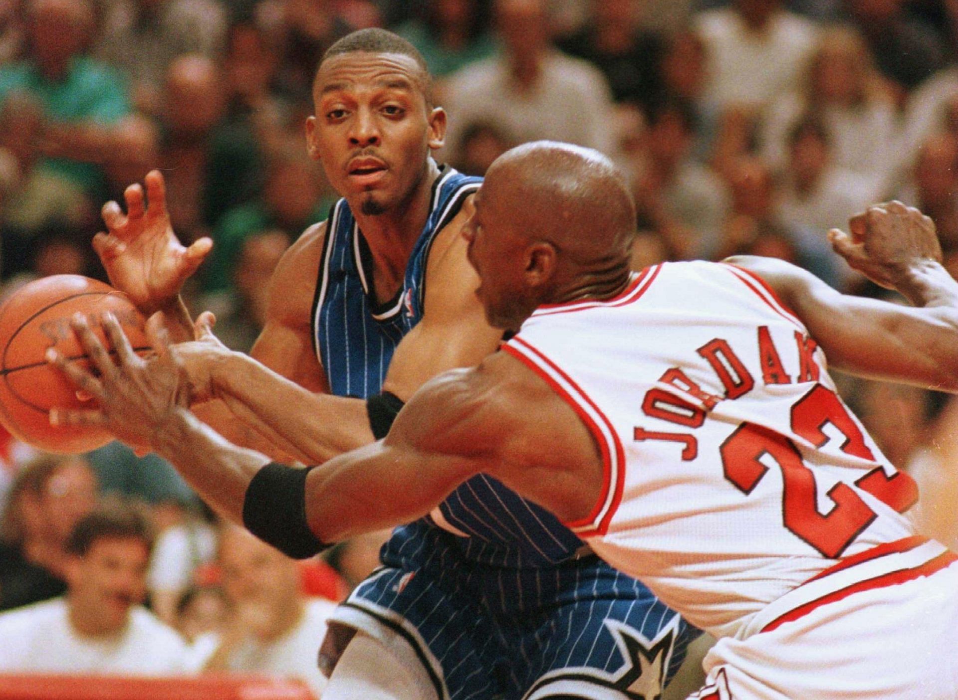 Forward Michael Jordan of the Chicago Bulls knocks the ball out of the hands of guard Penny Hardaway of the Orlando Magic during second-quarter action of game 1 of the Eastern Conference Championships - Source: Getty