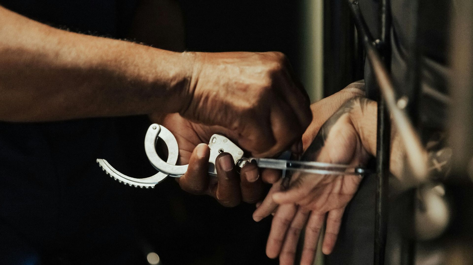 A convict being arrested (Representative Photo by cottonbro studio ) 