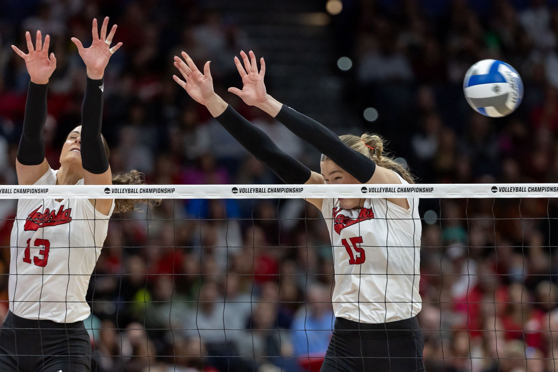 Jackson donning the No.15 of Nebraska Cornhuskers along with Merritt Beason at the NCAA Volleyball Championships (Image via: Getty Images)