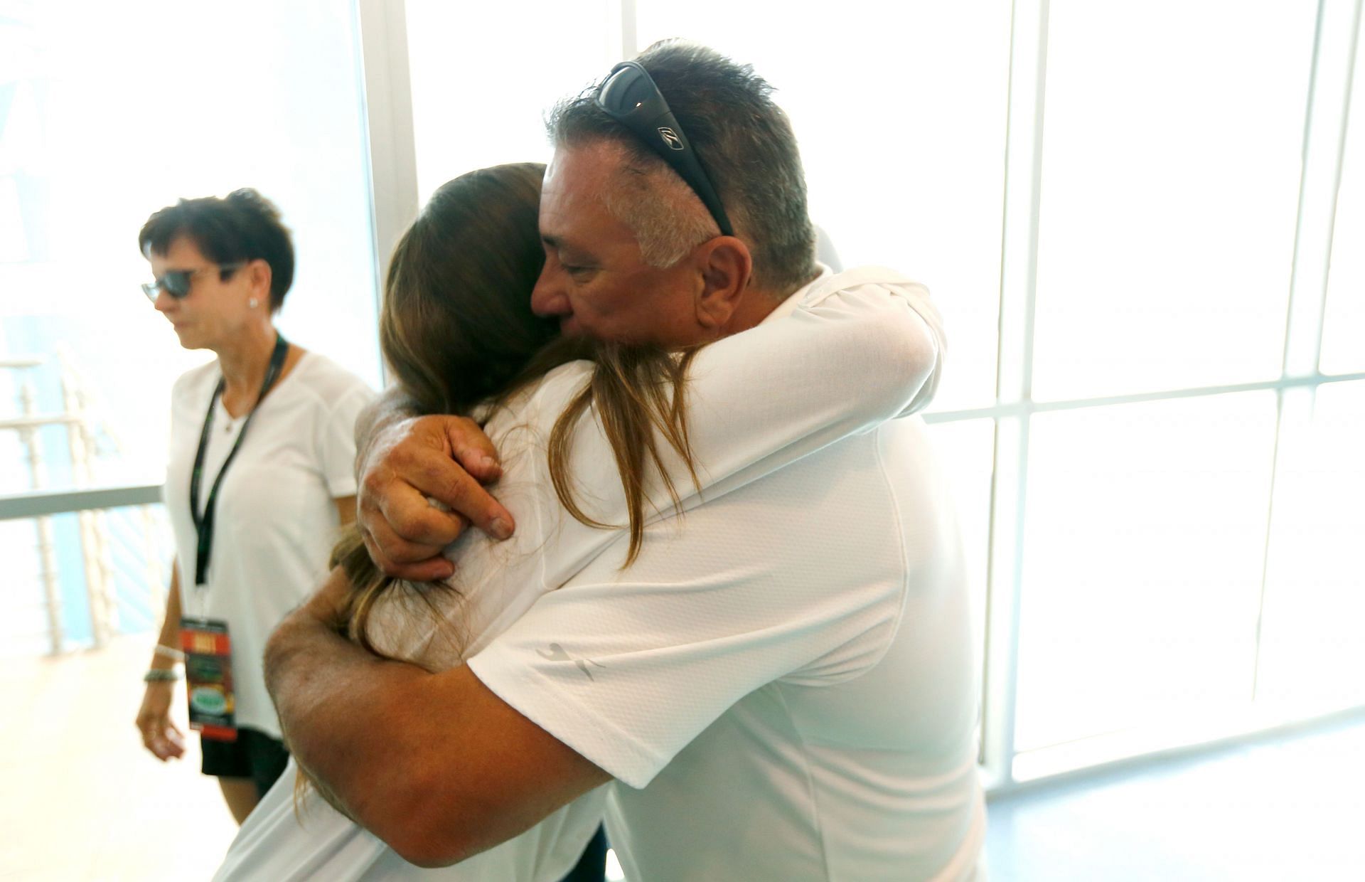 Danica Patrick hugs her father at the Monster Energy NASCAR Cup Series Championship Ford EcoBoost 400 - Source: Getty