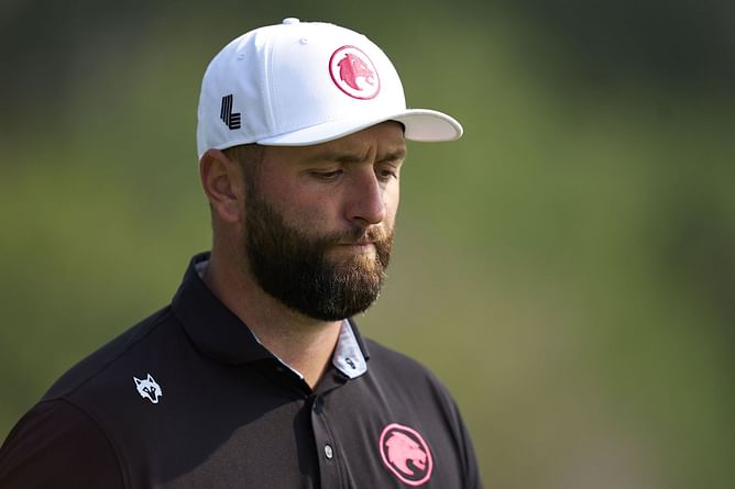 Jon Rahm’s shot gets stuck in the bush amid fears of missing the cut at the Dubai Desert Classic