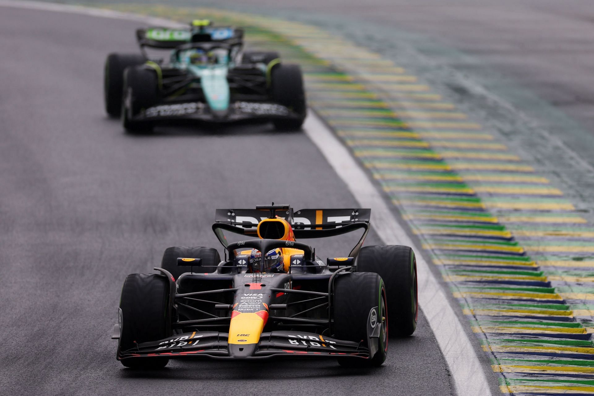 Max Verstappen leads Fernando Alonso on track during the F1 Grand Prix of Brazil - Source: Getty