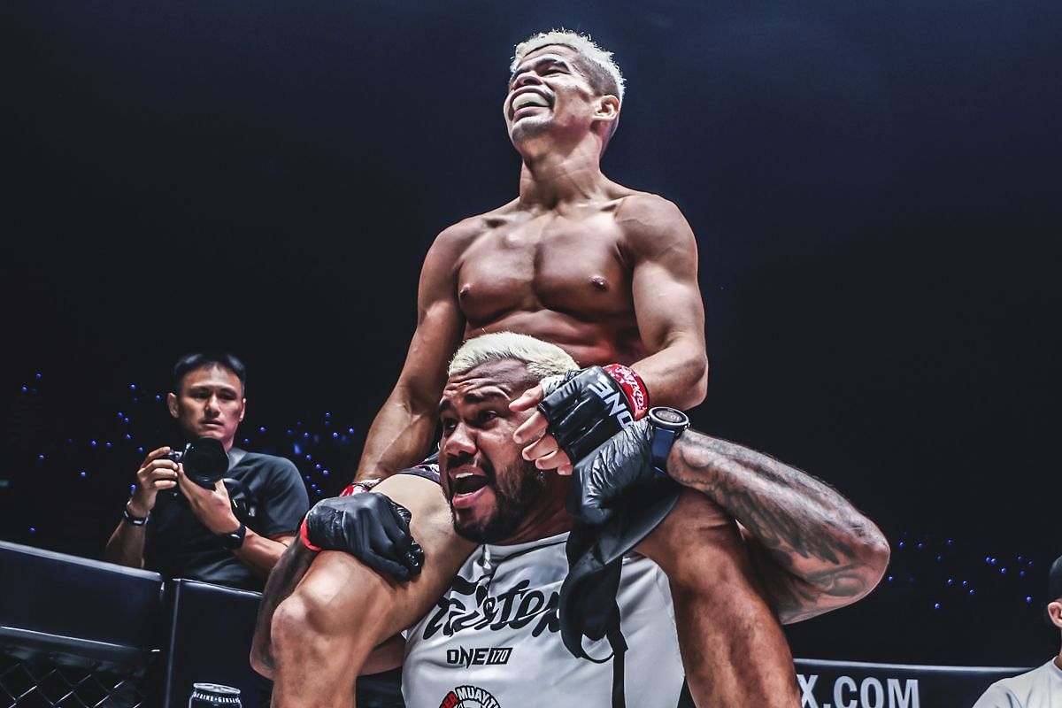 Fabricio Andrade celebrates his world title win at ONE 170. [Photo from ONE Championship]