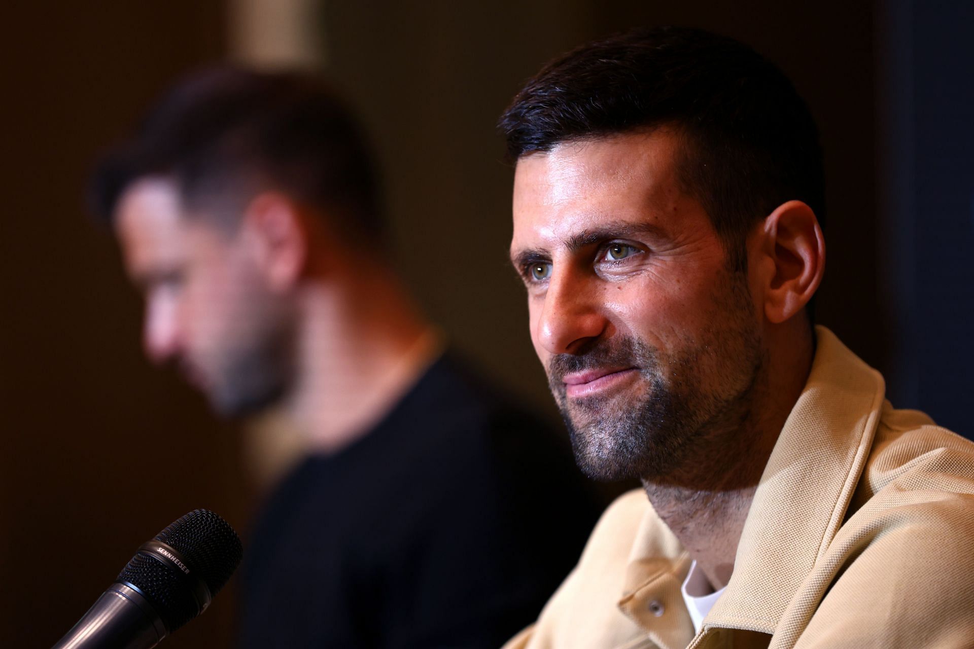 Novak Djokovic at a press Conference - Image Source: Getty