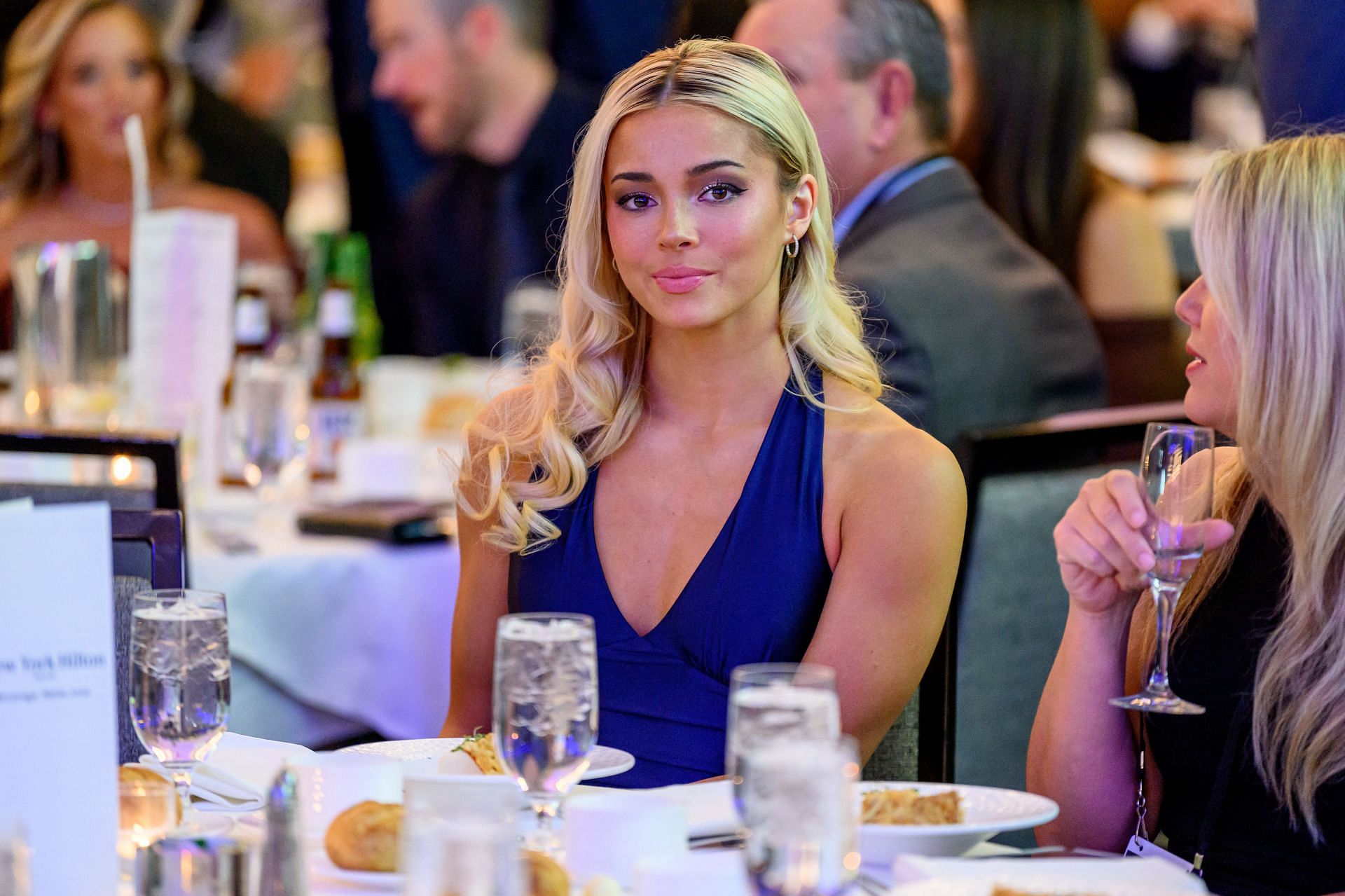 Dunne donning a blue dress at the 2025 BBWWA Dinner at New York Hilton (Image via: Getty Images)