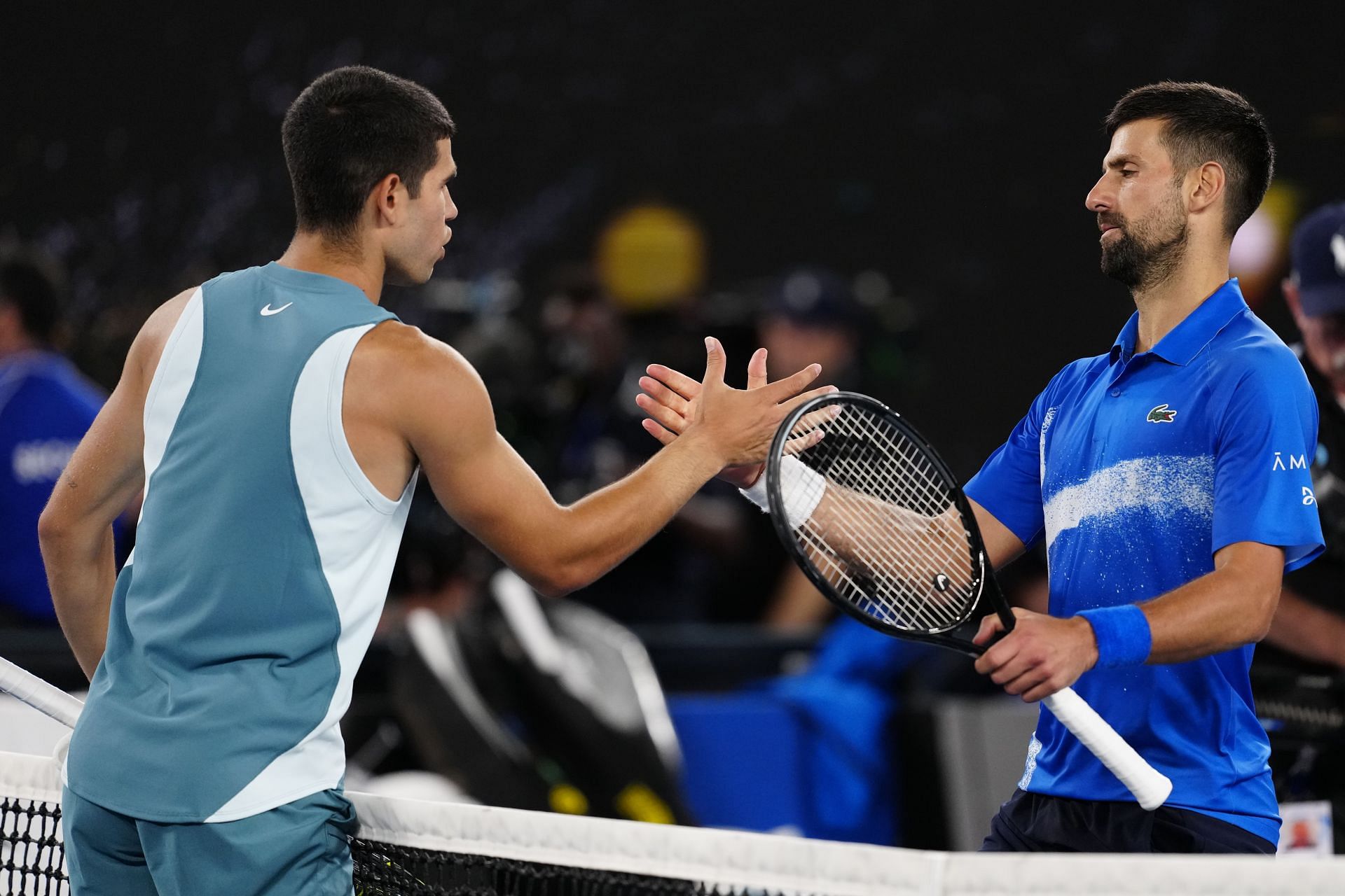 Carlos Alcaraz (left) and Novak Djokovic (right) after their 2025 Australian Open quarterfinal (Source: Getty)