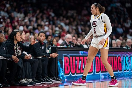 Tessa Johnson (#5) of the South Carolina Gamecocks talks with head coach Dawn Staley in the second half during their game against the Wofford Terriers at Colonial Life Arena on Dec. 29, 2024, in Columbia, South Carolina. Photo: Getty