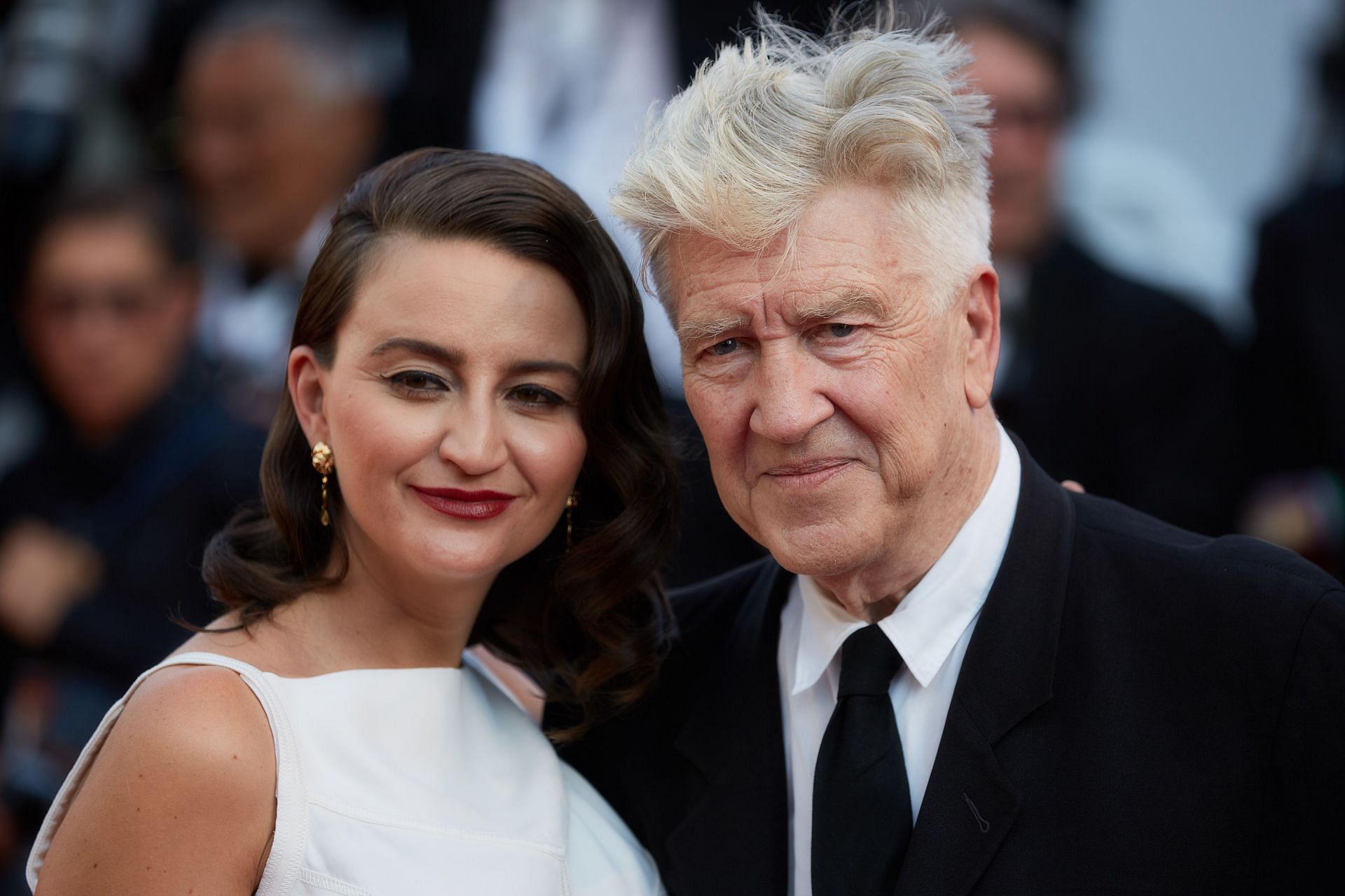 David Lynch with Emily Stofle at the 70th Annual Cannes Film Festival (Image via Getty)