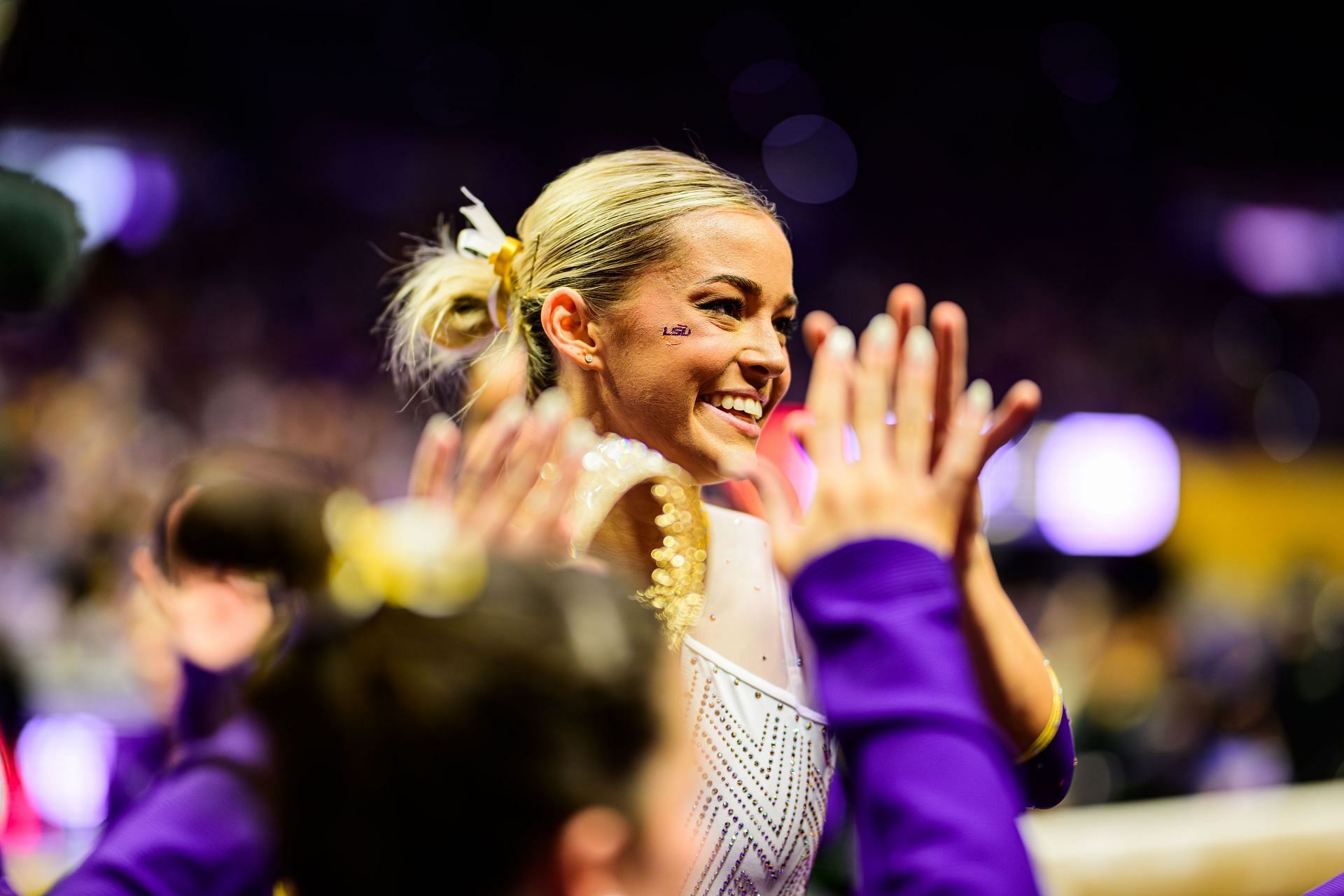 Olivia Dunne with her teammates at the 2024 LSU meet season - (Source: Getty)