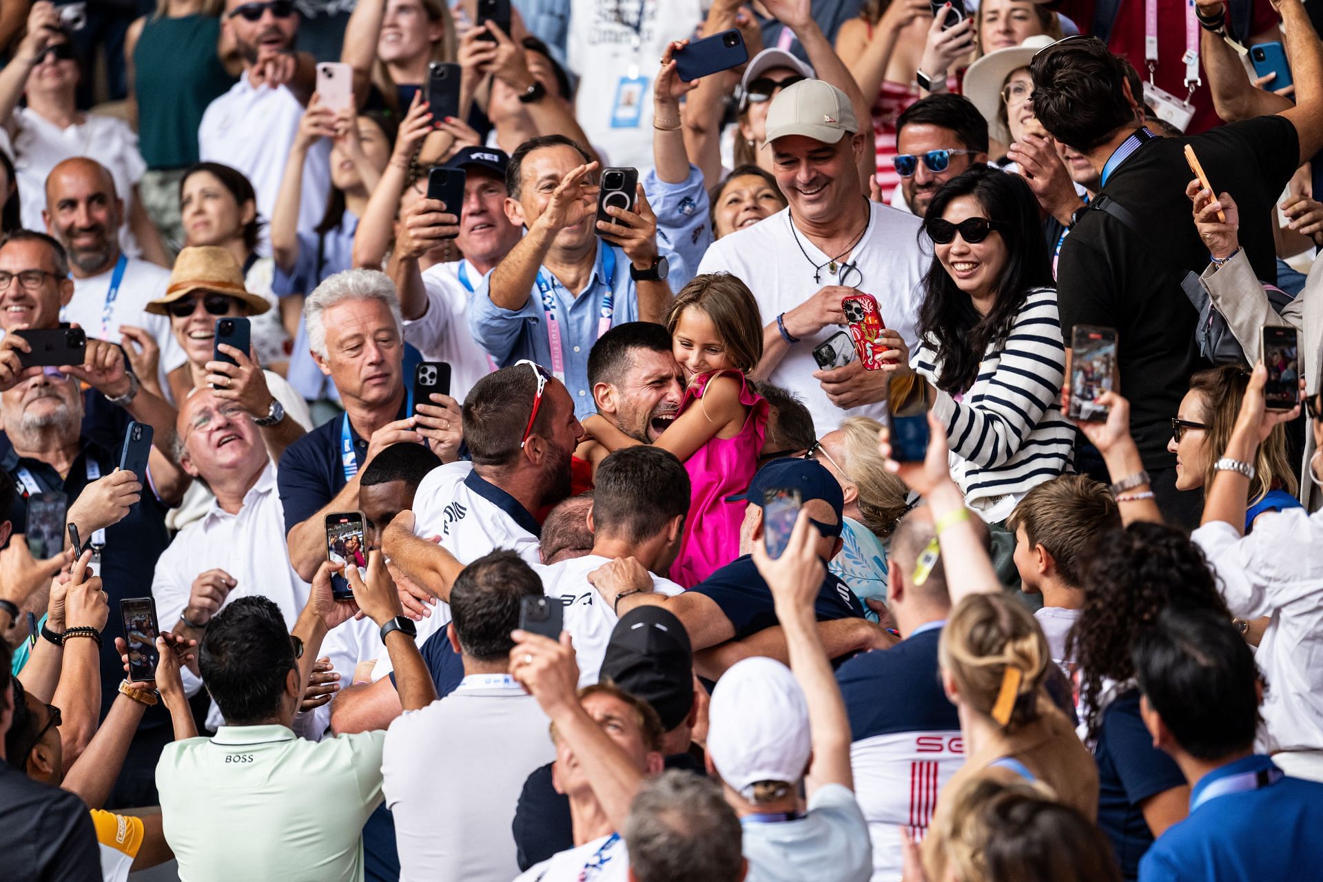 Novak Djokovic celebrates his gold medal victory at 2024 Paris Olympics with his crew and family - Source: Getty