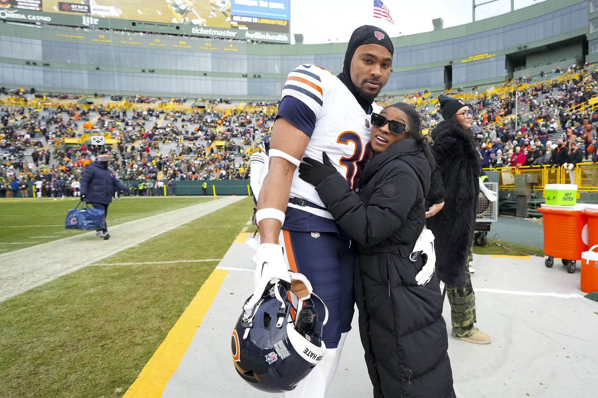 Simone Biles and Owens share a moment at the Chicago Bears v Green Bay Packers - (Source: Getty)