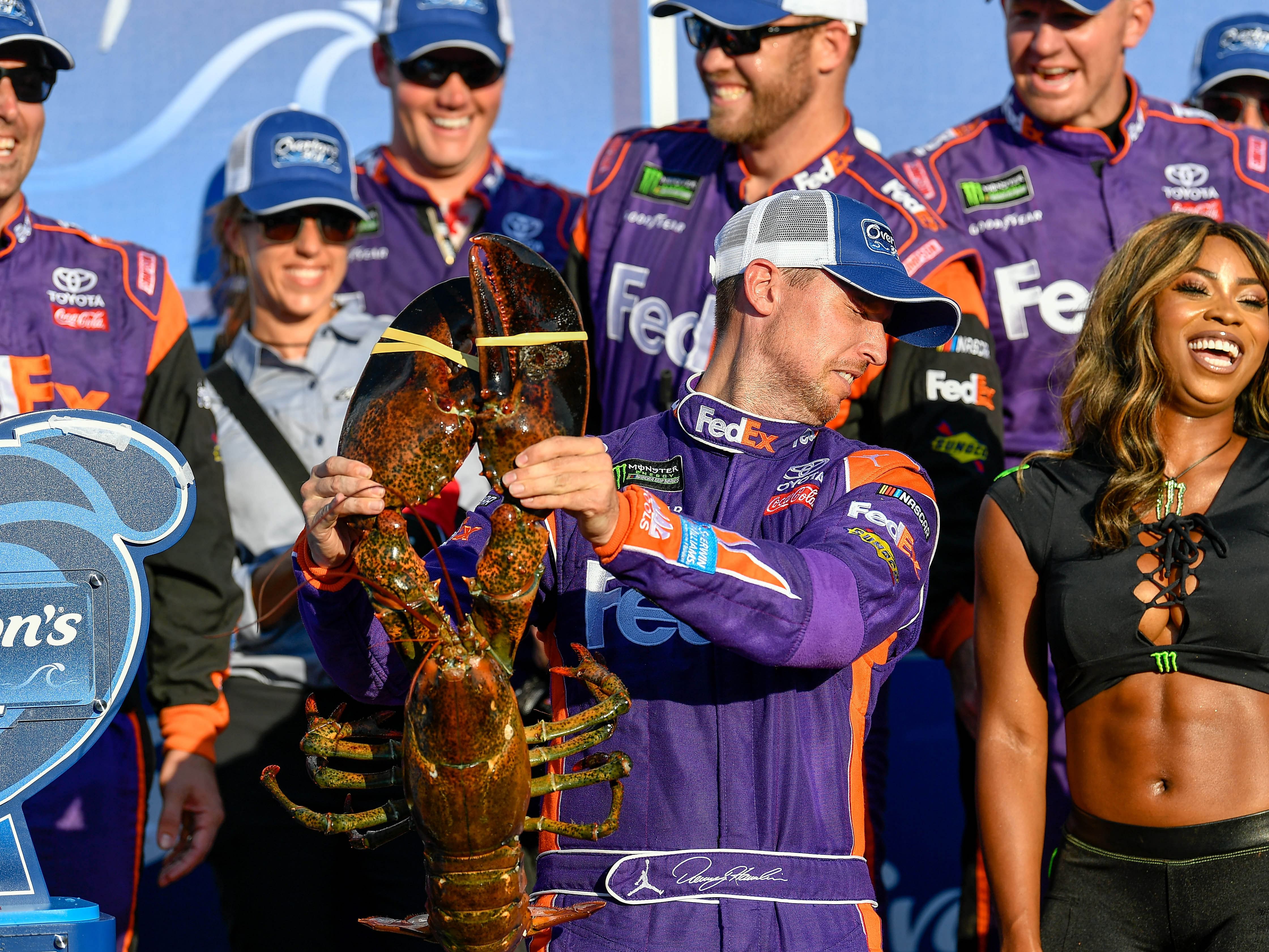 Denny Hamlin&#039;s infamous pose with a lobster after finishing first in the Overton&#039;s 301 at New Hampshire Motor Speedway - Source: Imagn