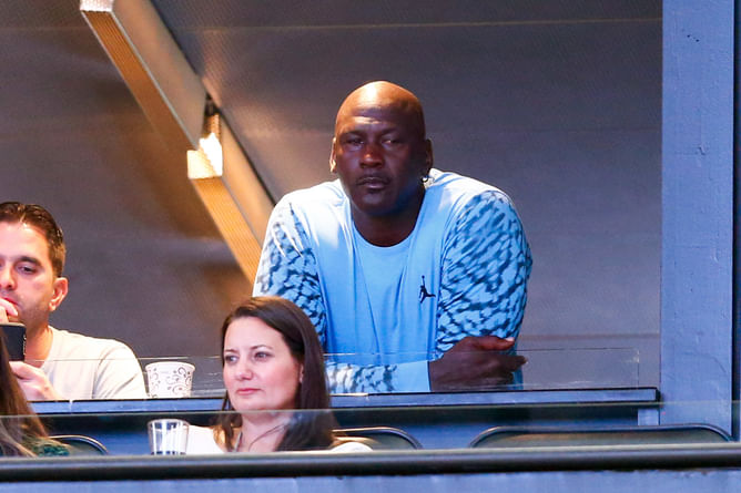 When Michael Jordan yanked Grant Hill's chain after UNC beat Duke: "I kind of gave him a little hard time"