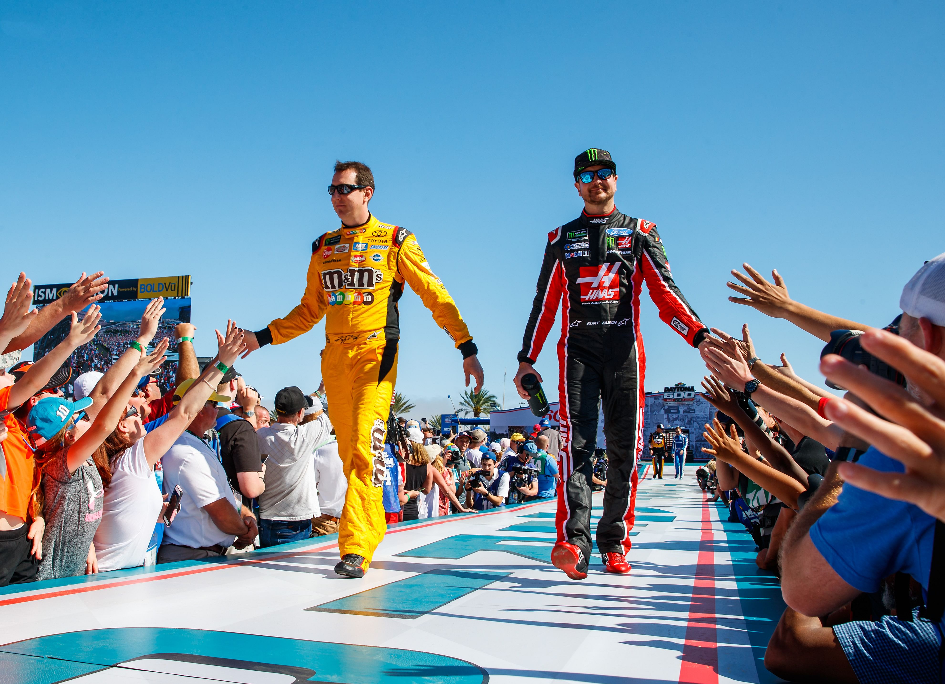 Feb 18, 2018; Daytona Beach, FL, USA; NASCAR driver Kyle Busch (left) and brother Kurt Busch during the Daytona 500 at Daytona International Speedway. Mandatory Credit: Mark J. Rebilas-Imagn Images - Source: Imagn