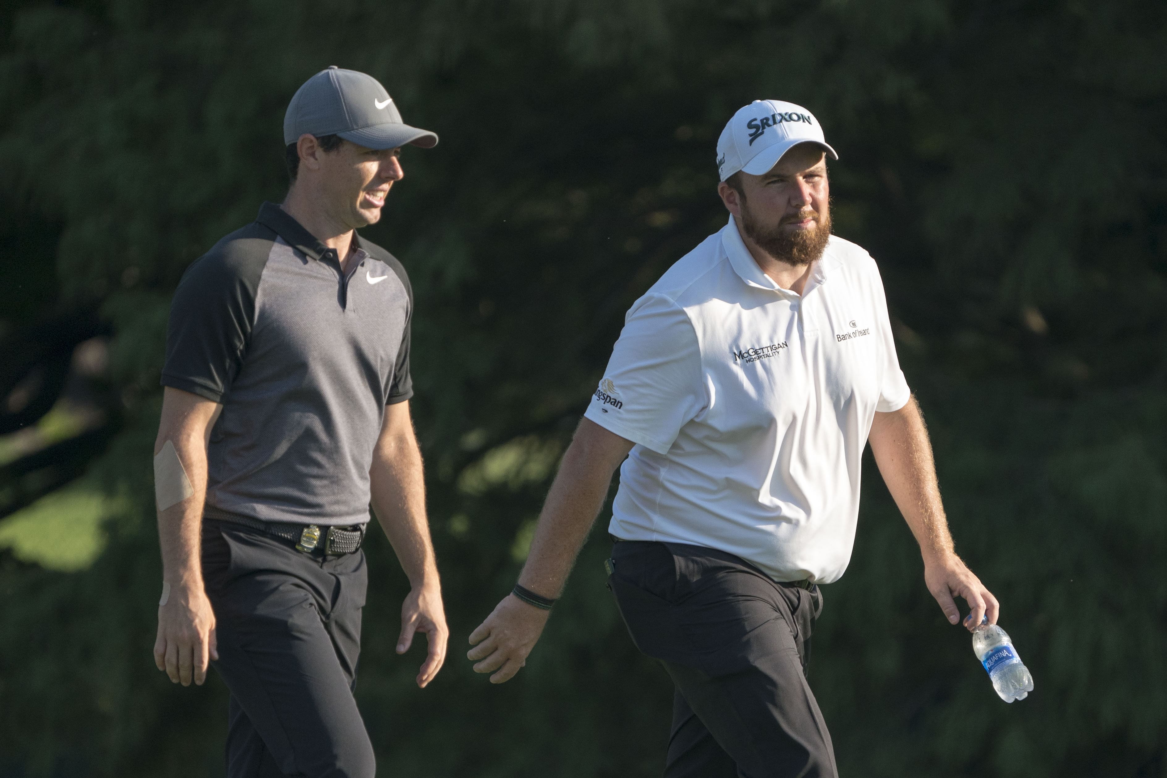 Shane Lowry and Rory McIlroy (Image via Imagn).