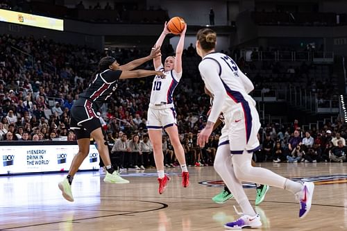 TCU guard Hailey Van LIth (#10) leaps in the air to pass the ball to center Sedona Prince (#13) during their NCAA game against the South Carolina Gamecocks on December 8, 2024, at Dickies Arena. Photo: Getty