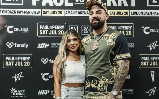 Mike Perry drops hilarious Will Ferrell GIF reacting to almost being put to sleep by his wife's choke