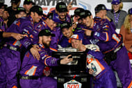Denny Hamlin (11) celebrates with his team after winning the 2019 Daytona 500 - Source: Imagn