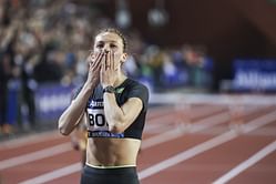 Femke Bol reacts as she receives a customized surprise before making her season debut