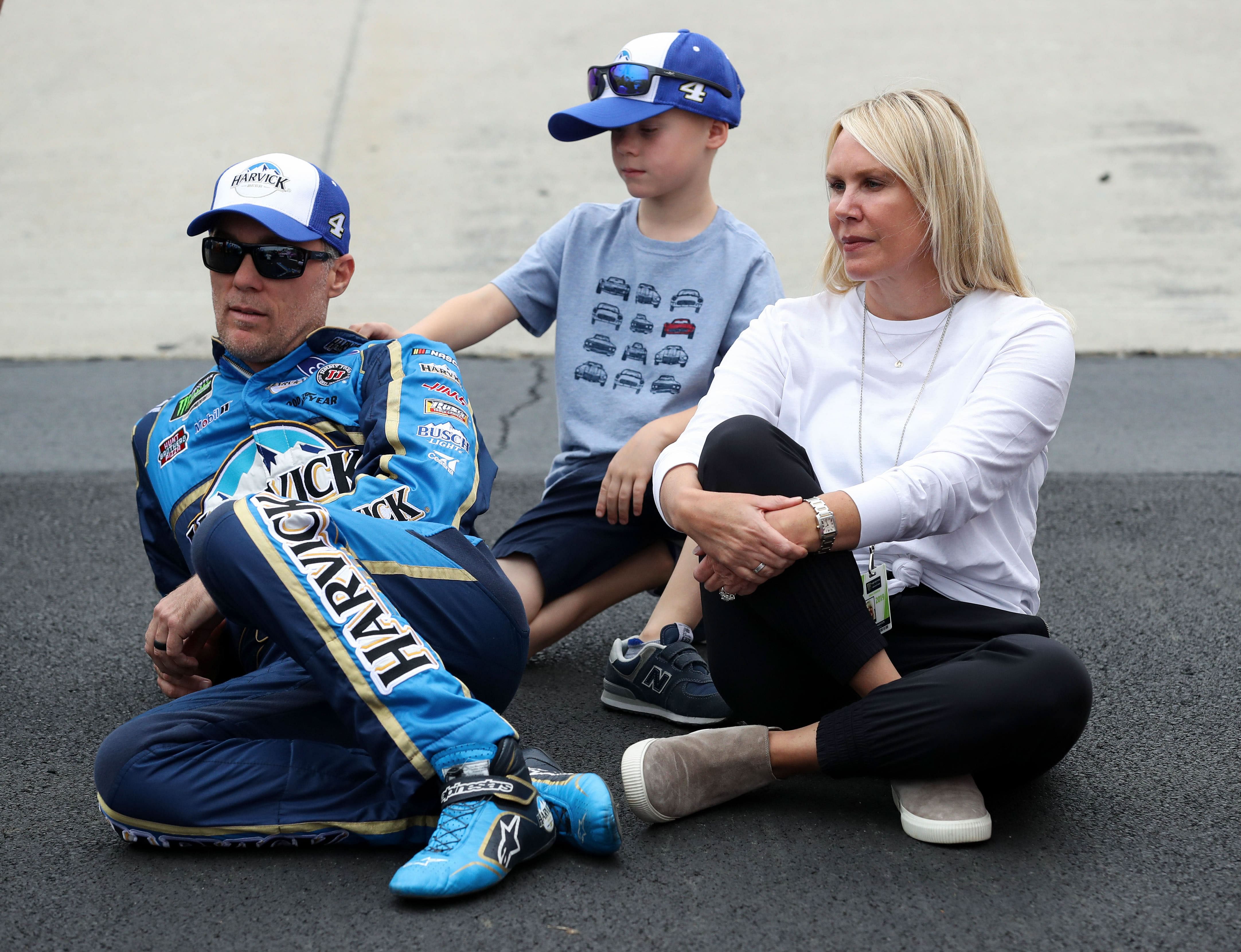 Kevin Harvick (left) sits on pit road with his wife DeLana Harvick and their son Keelan Harvick prior to the Drydene 400 at Dover International Speedway., October 6th, 2019 - Source: Imagn