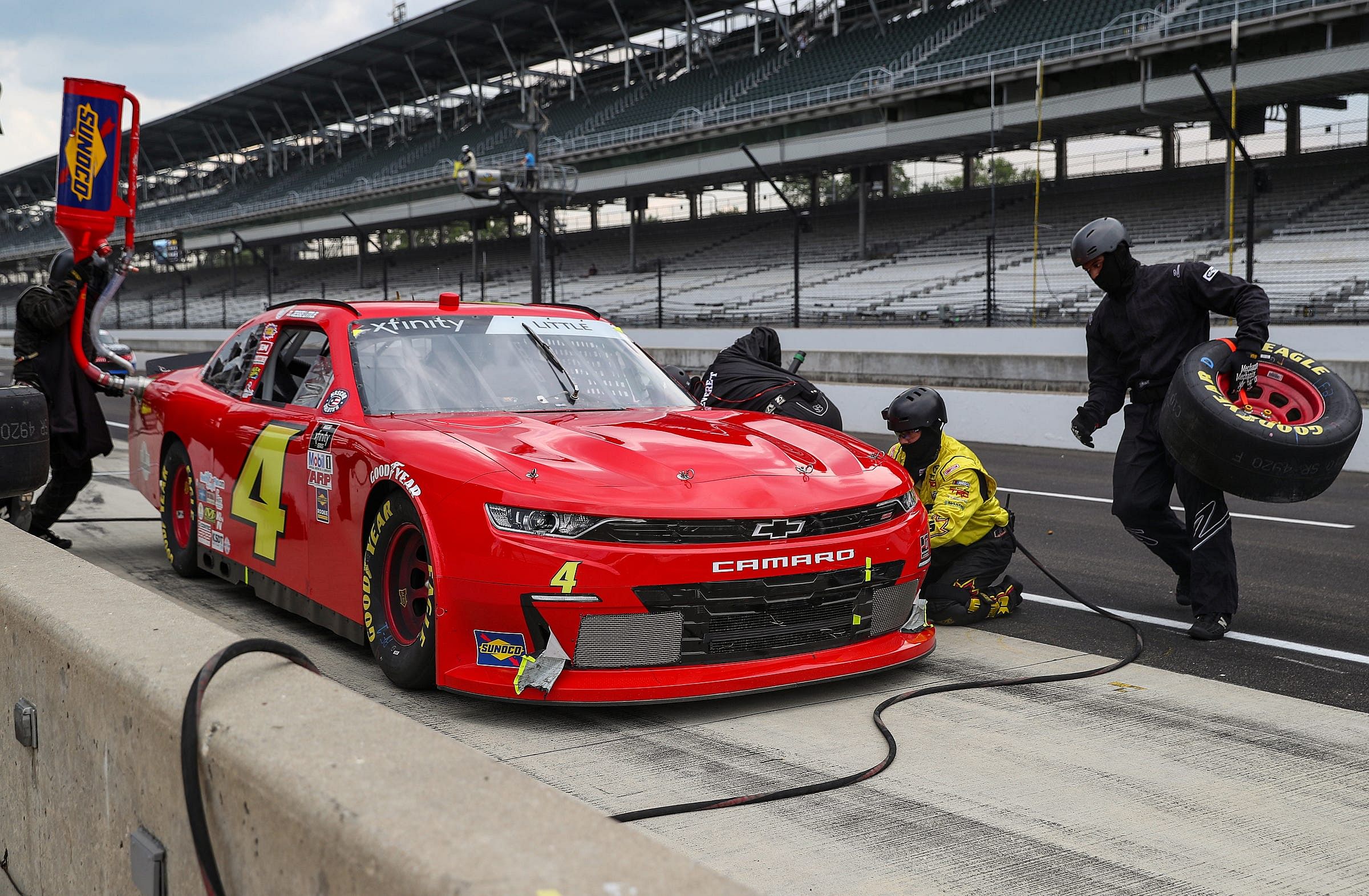 Crew members complete a pit stop for JD Motorsports driver Jesse Little (4) during the NASCAR Xfinity series Pennzoil 150 at Indianapolis Motor Speedway on Saturday, July 4, 2020. Indianapolis Motor Speedway Nascar Xfinity Series Pennzoil 150 On July 4 2020 Return To Racing Since Coronavirus Covid 19 Pandemic - Source: Imagn