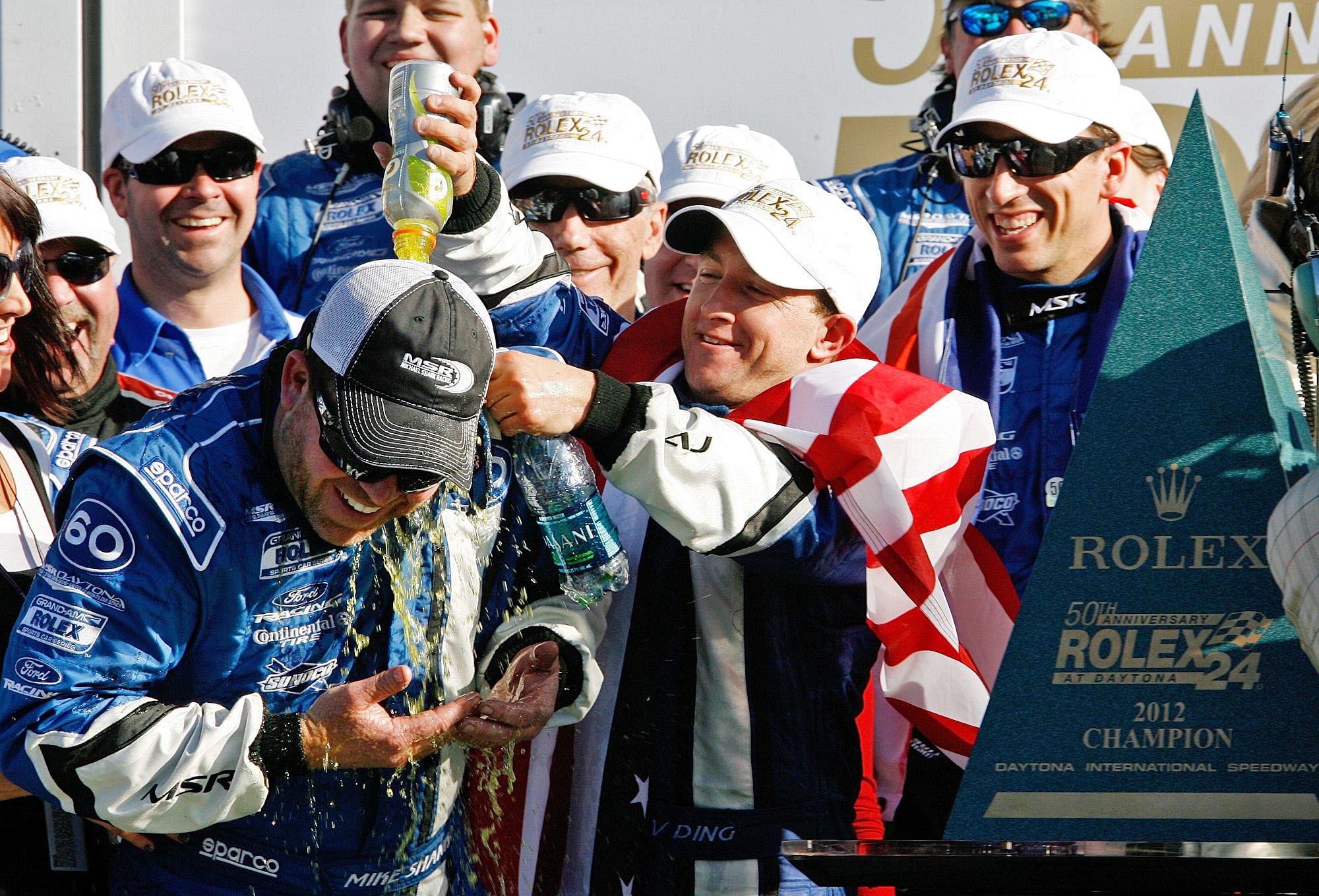 AJ Allmendinger celebrates with car owner Michael Shank after winning the Rolex 24 at Daytona - Source: Imagn