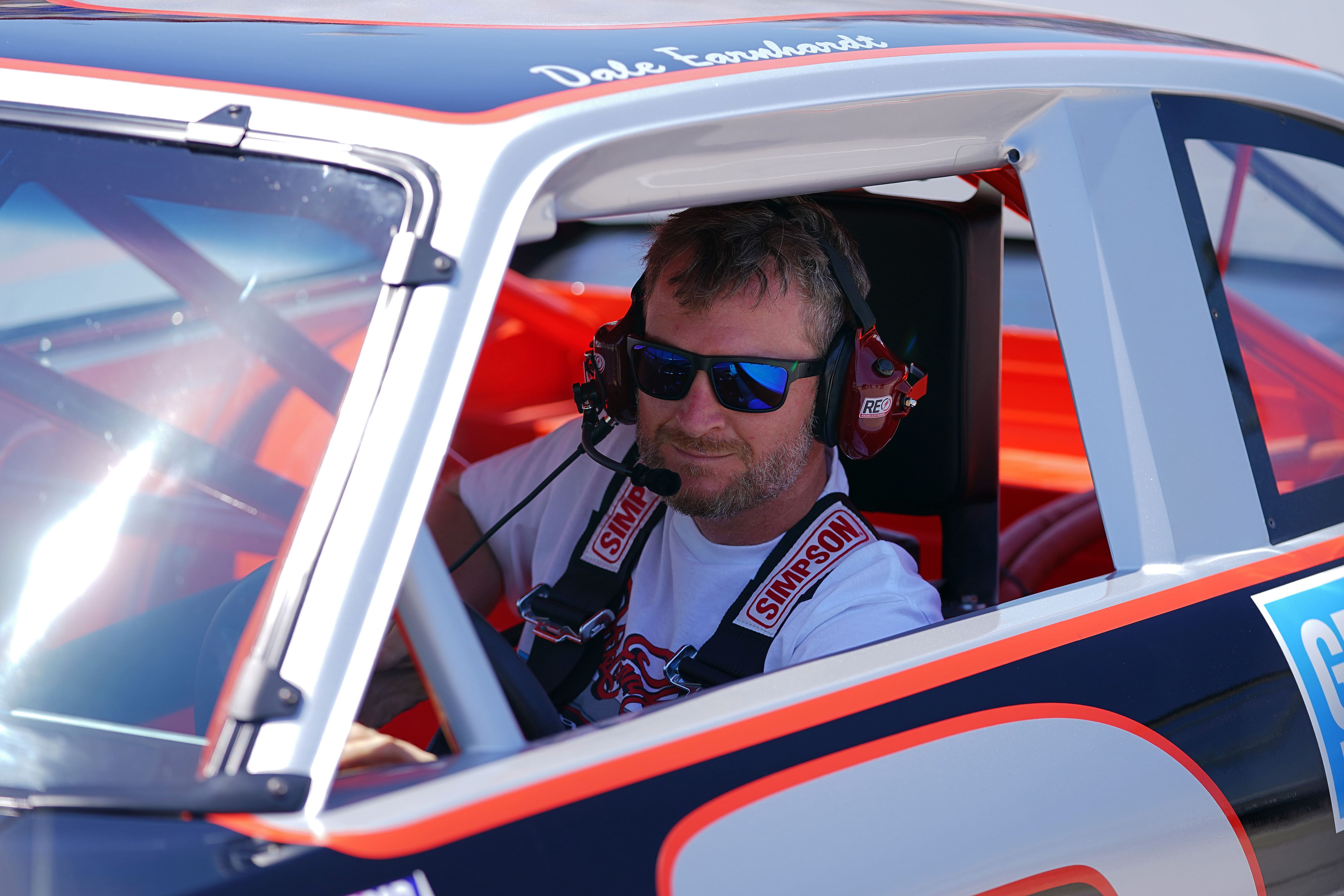 Former NASCAR driver Dale Earnhardt Jr. sits in the restored 1984 Chevy Nova driven by his father the late Dale Earnhardt Sr. - Source: Imagn