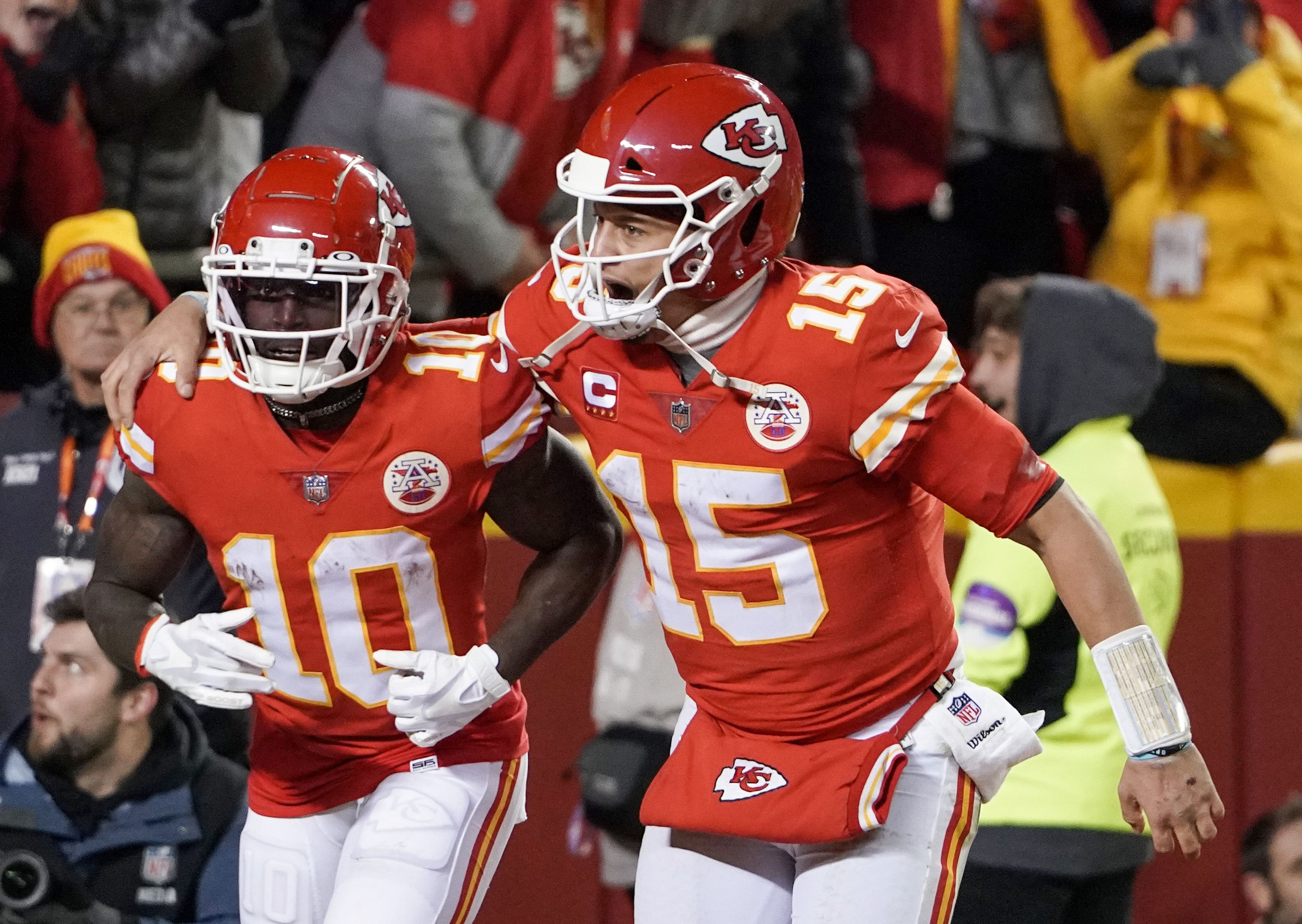 Kansas City Chiefs quarterback Patrick Mahomes (15) celebrates with wide receiver Tyreek Hill (10) - Source: Imagn