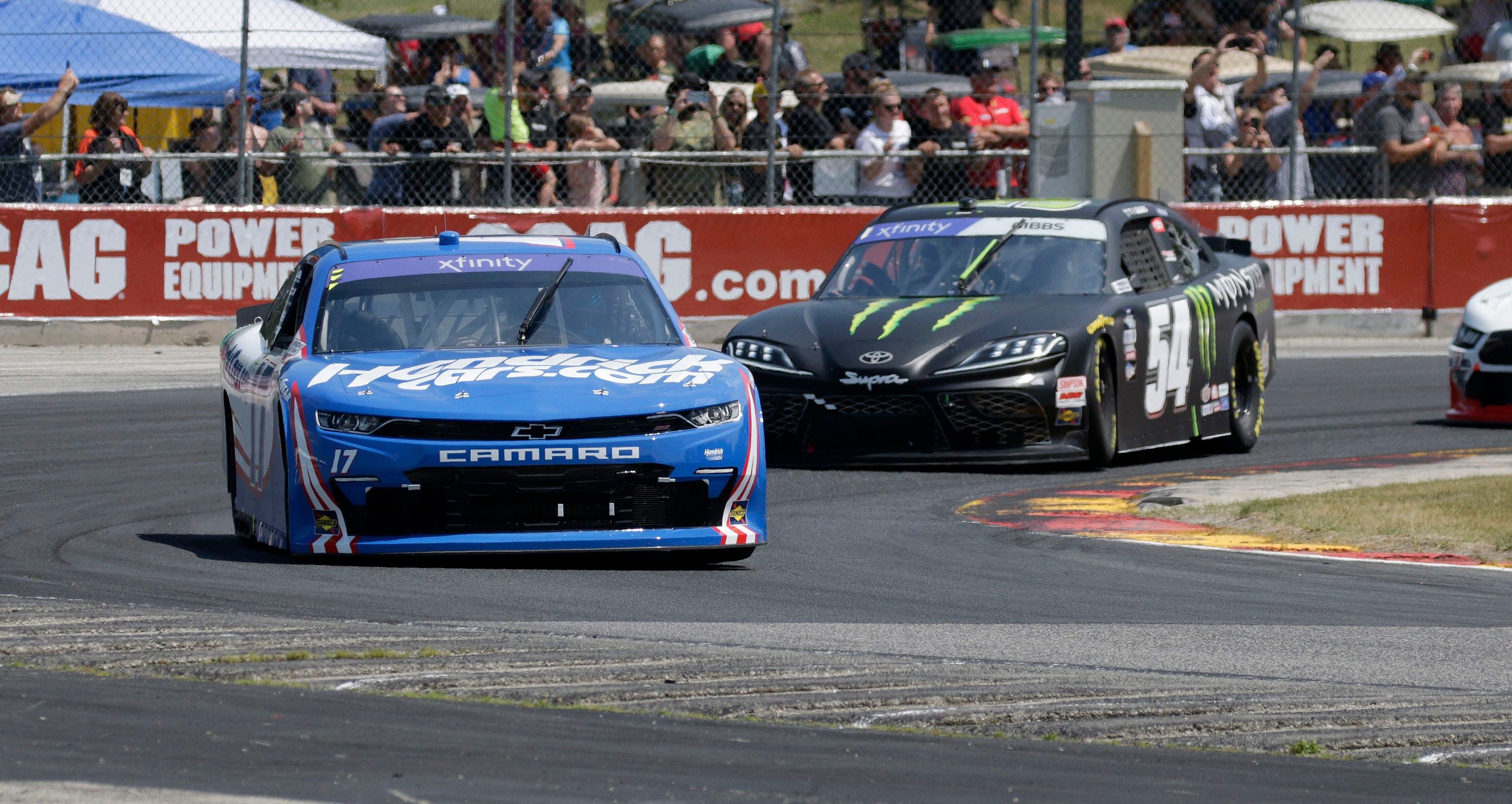 Kyle Larson (17) corners turn 5 with Ty Gibbs (54) close behind during the NASCAR Xfinity Series Henry 180 at Road America - Source: Imagn