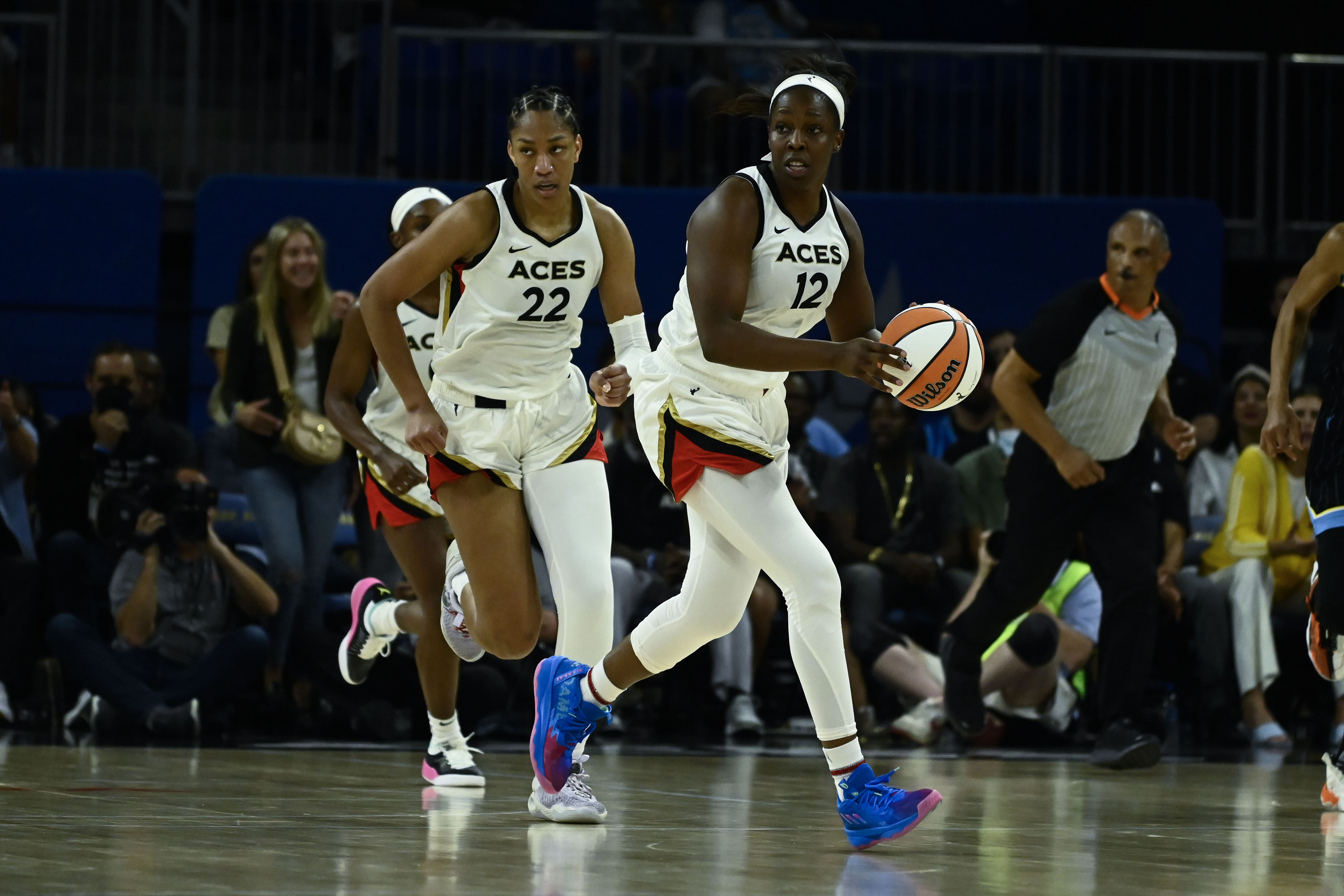 Jul 26, 2022; Chicago, IL, USA; Las Vegas Aces guard Chelsea Gray (12) moves the ball with Las Vegas Aces forward A