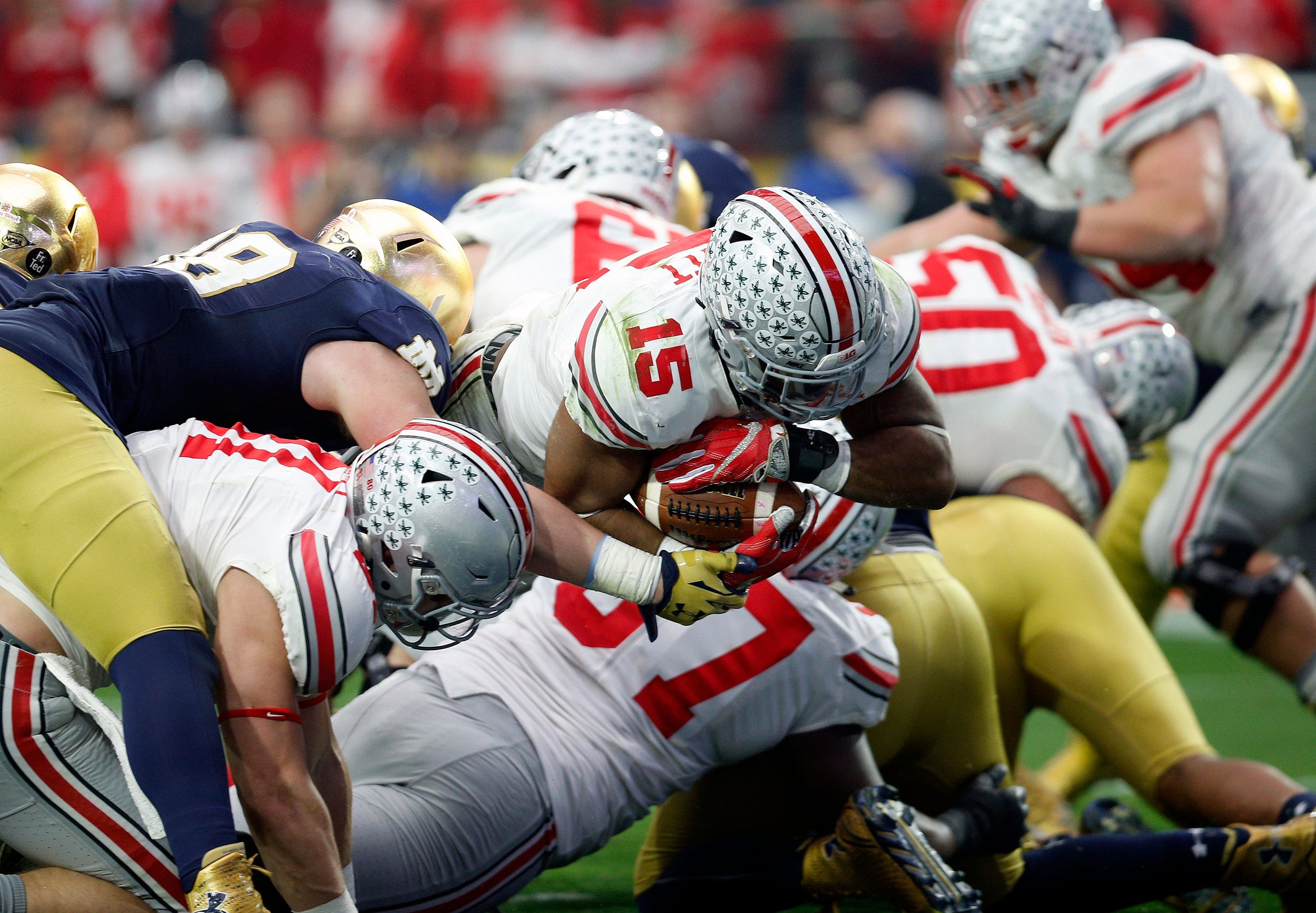 Ezekiel Elliott (15) and Ohio State beat the Fighting Irish at the 2016 Fiesta Bowl. - Source: Imagn