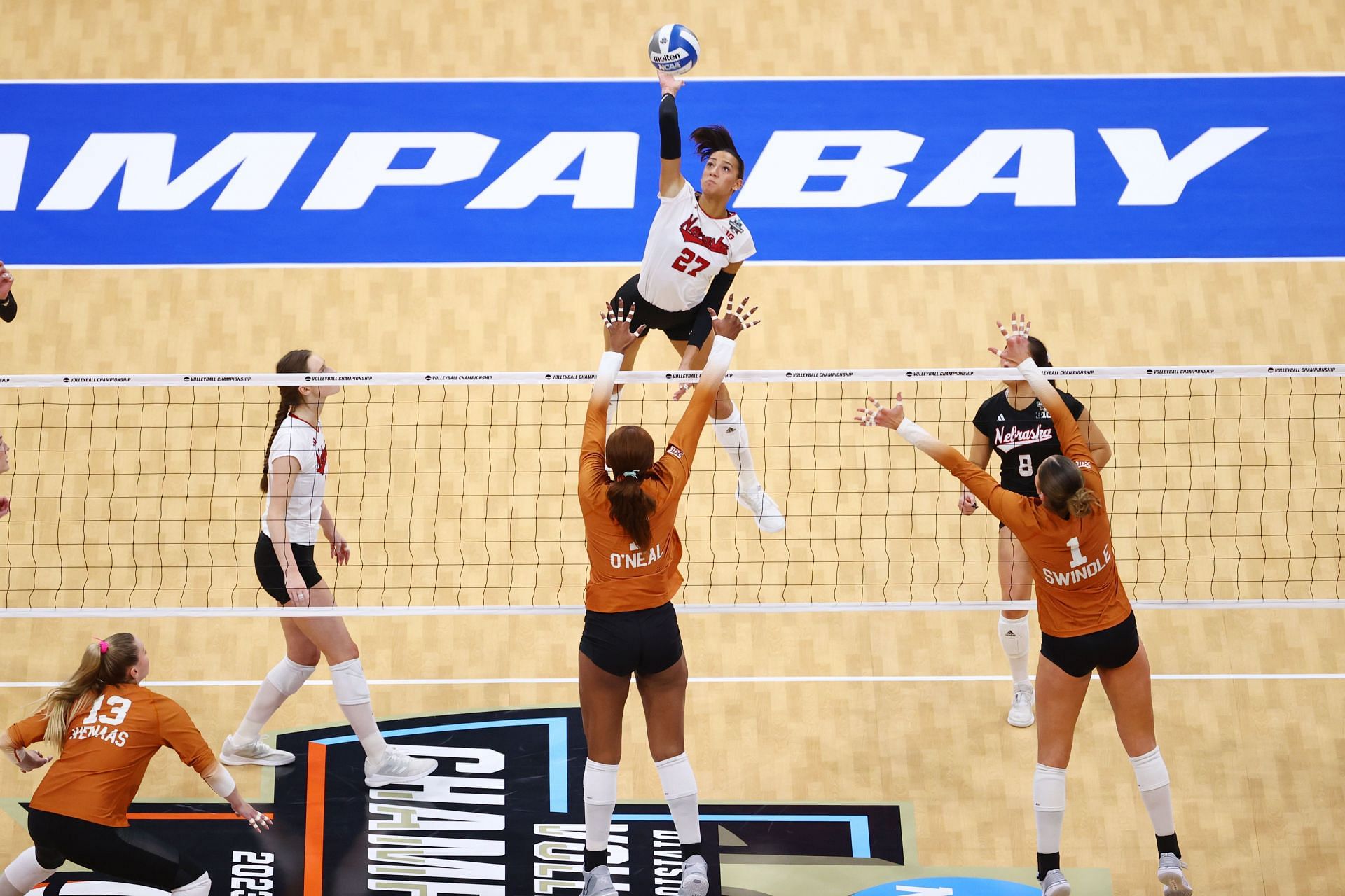 Harper Murray in white and red shades of Nebraska during a match during the 2023 NCAA tournament (Image via: Getty Images)