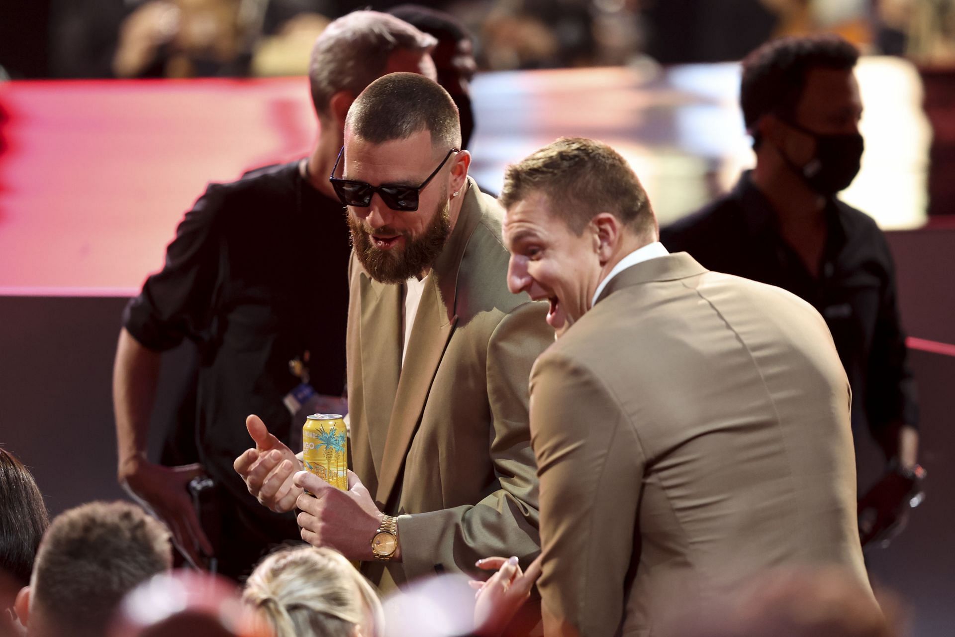 Travis Kelce of the Kansas City Chiefs and Rob Gronkowski of the Tampa Bay Buccaneers chat at the NFL Honors show at the YouTube Theater on February 10, 2022 in Inglewood, California. - Source: Getty