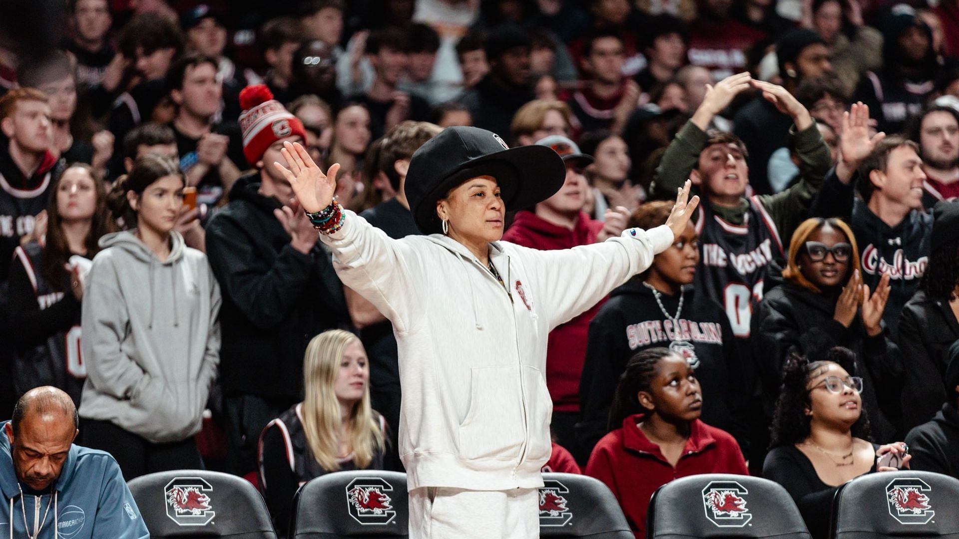 Dawn Staley watching the Gamecocks men