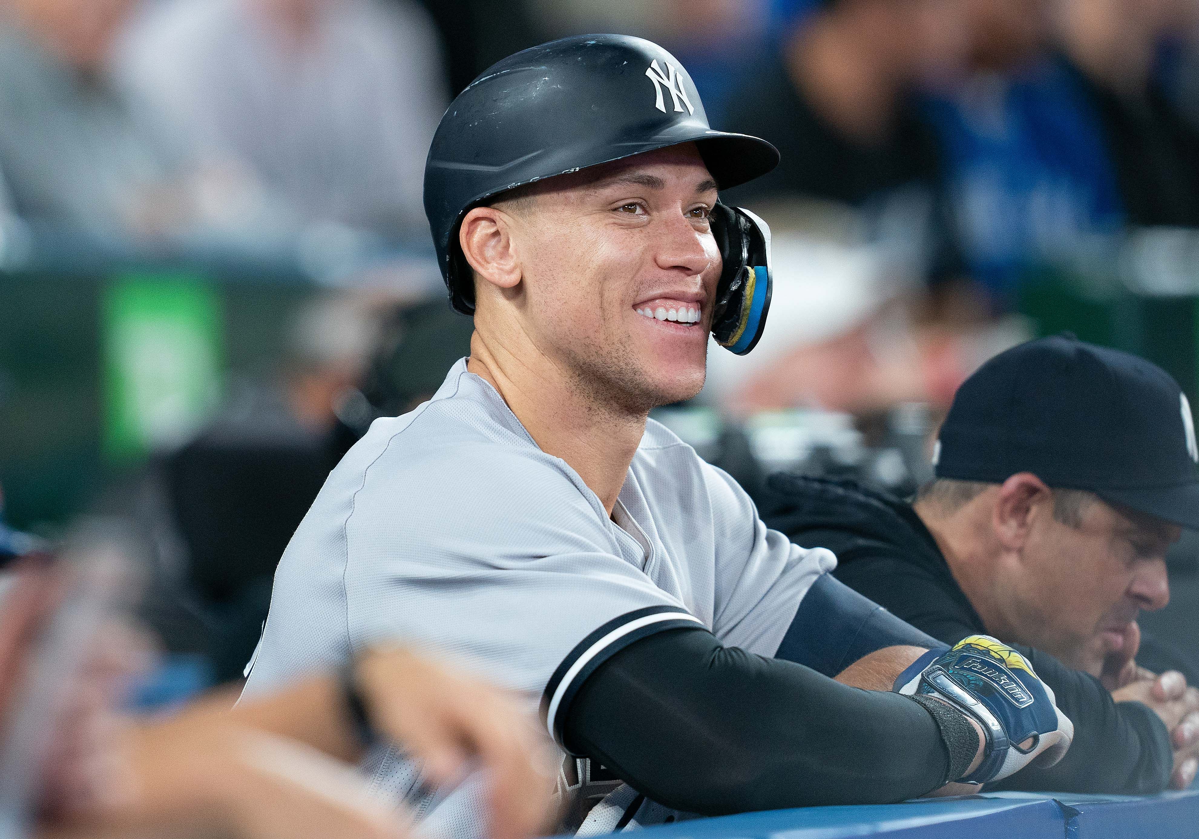 Sep 28, 2022; Toronto, Ontario, CAN; New York Yankees designated hitter Aaron Judge (99) watches the play from the dugout against the Toronto Blue Jays during the fourth inning at Rogers Centre. Mandatory Credit: Nick Turchiaro-Imagn Images - Source: Imagn