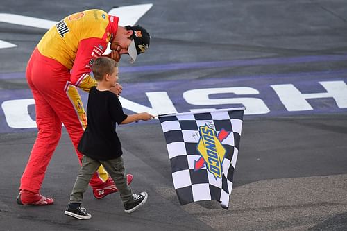  Joey Logano celebrates his victory of the Cup Championship race with son Hudson at Phoenix Raceway in 2022 - Source: Imagn