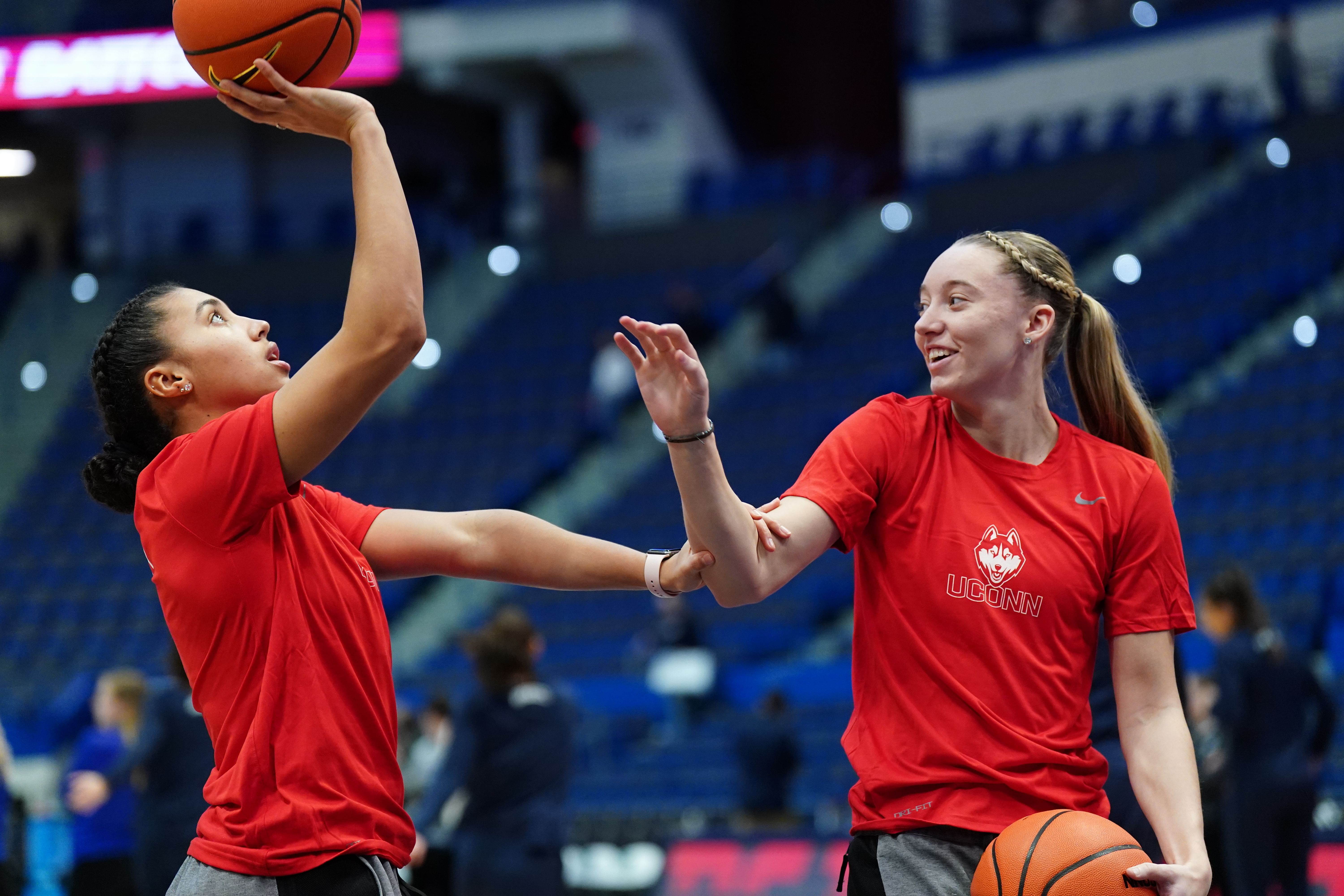 UConn Huskies guard Azzi Fudd (#35) and guard Paige Bueckers (#5) on the court during warm-ups before the start of the game against the Seton Hall Pirates at XL Center. Photo: Imagn