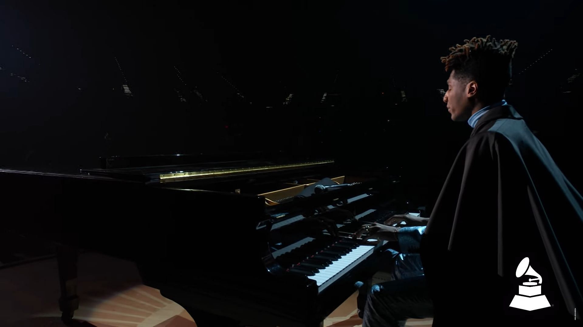 Jon Batiste playing the Grand Piano during the Grammys 2024. (Image via Recording Academy/GRAMMYs)