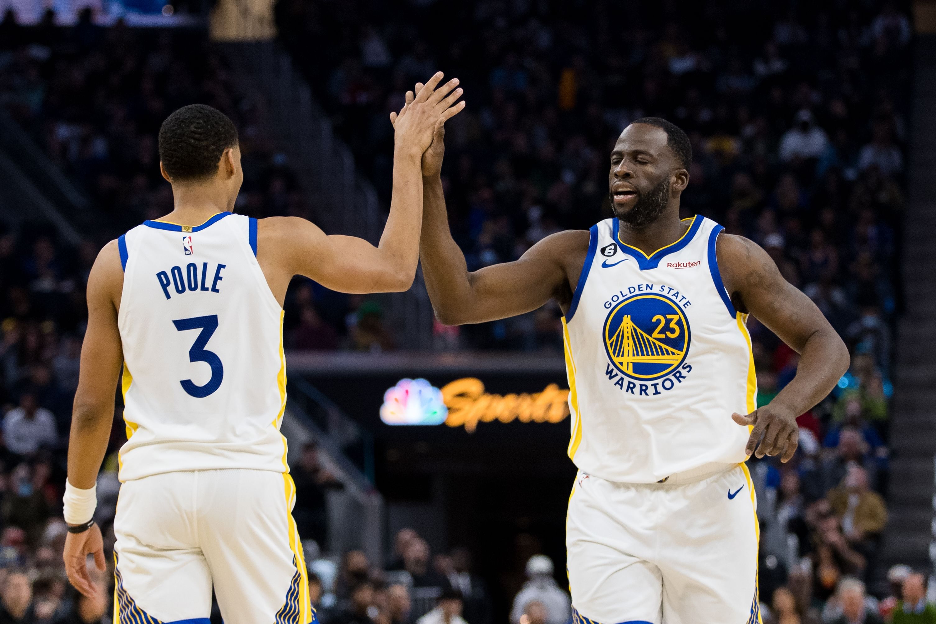 Jan 22, 2023; San Francisco, California, USA; Golden State Warriors guard Jordan Poole (3) and forward Draymond Green (23) celebrate after Poole drew a foul against the Brooklyn Nets during the first half at Chase Center. Mandatory Credit: John Hefti-Imagn Images - Source: Imagn