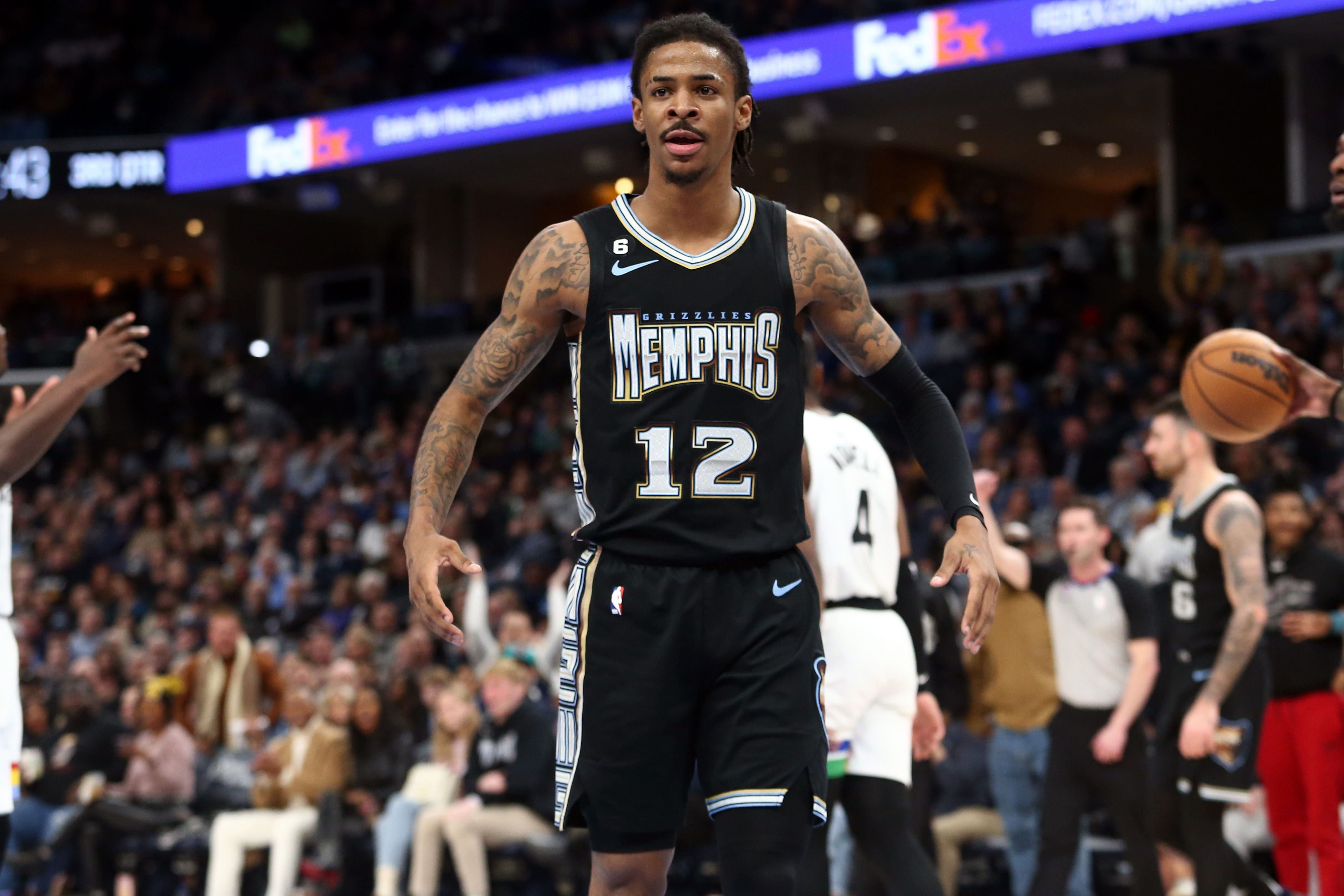 Memphis Grizzlies guard Ja Morant reacts against the Minnesota Timberwolves at FedExForum. Photo Credit: Imagn